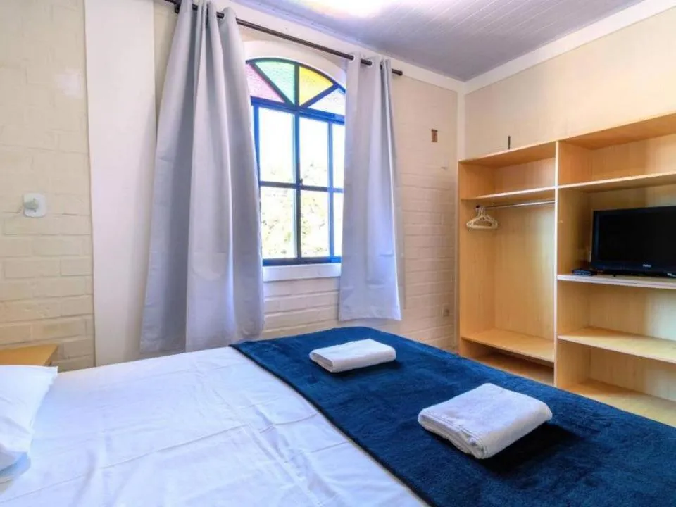 Bed in Pousada Maré de Lua