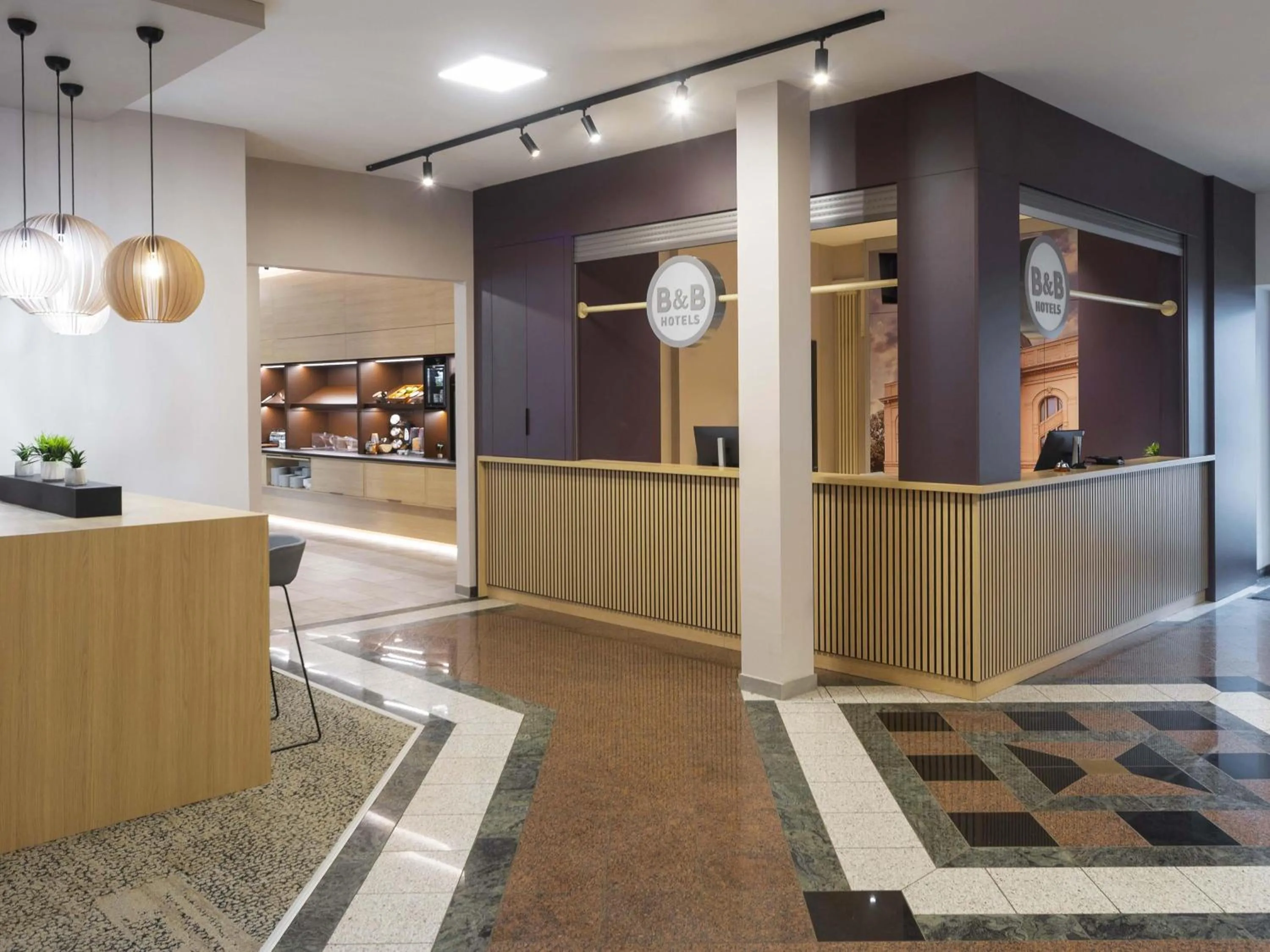 Lobby or reception in B&B HOTEL Gera