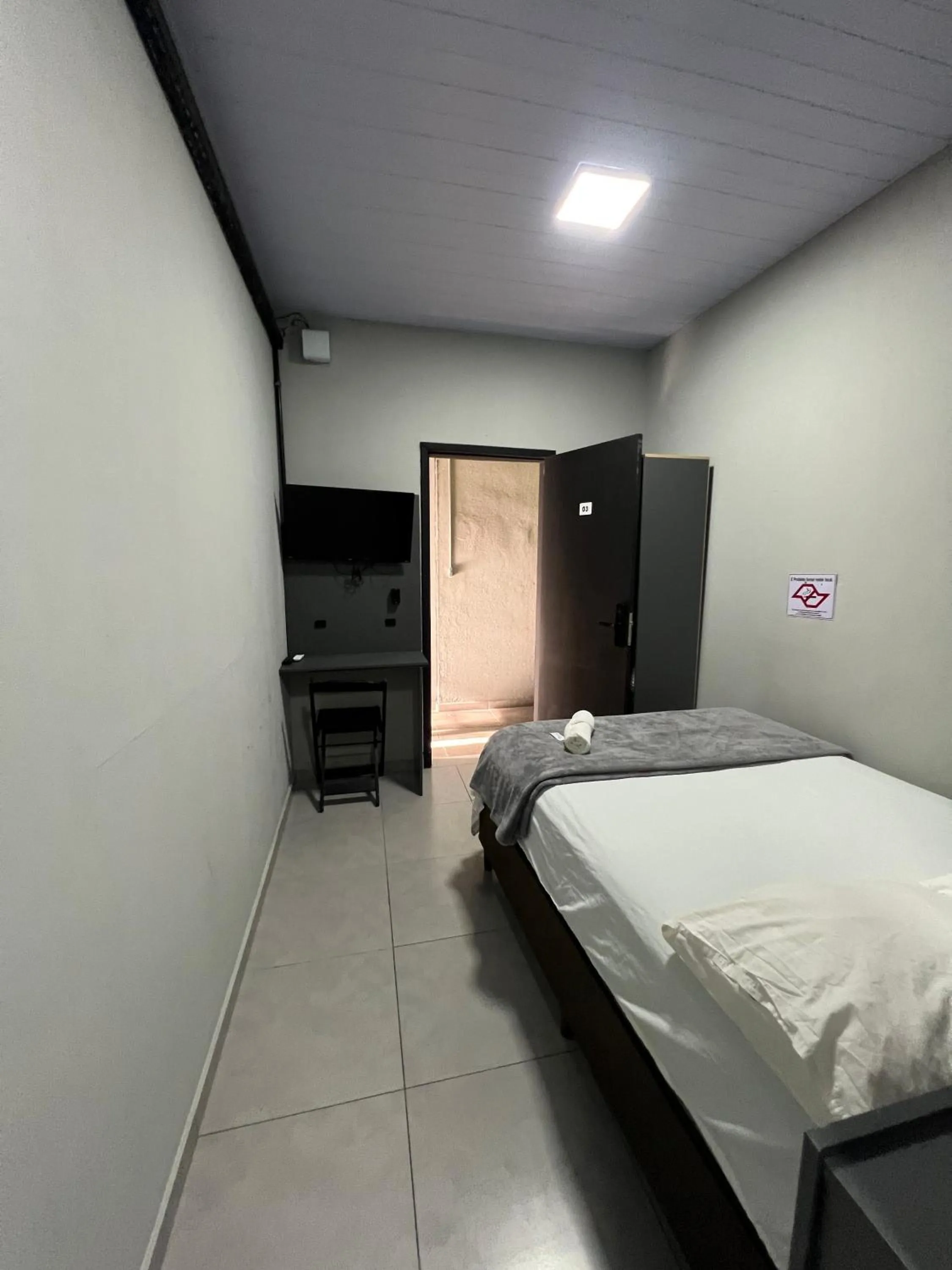 Photo of the whole room, Bed in Esquina 8 Suítes Confort & Hostel