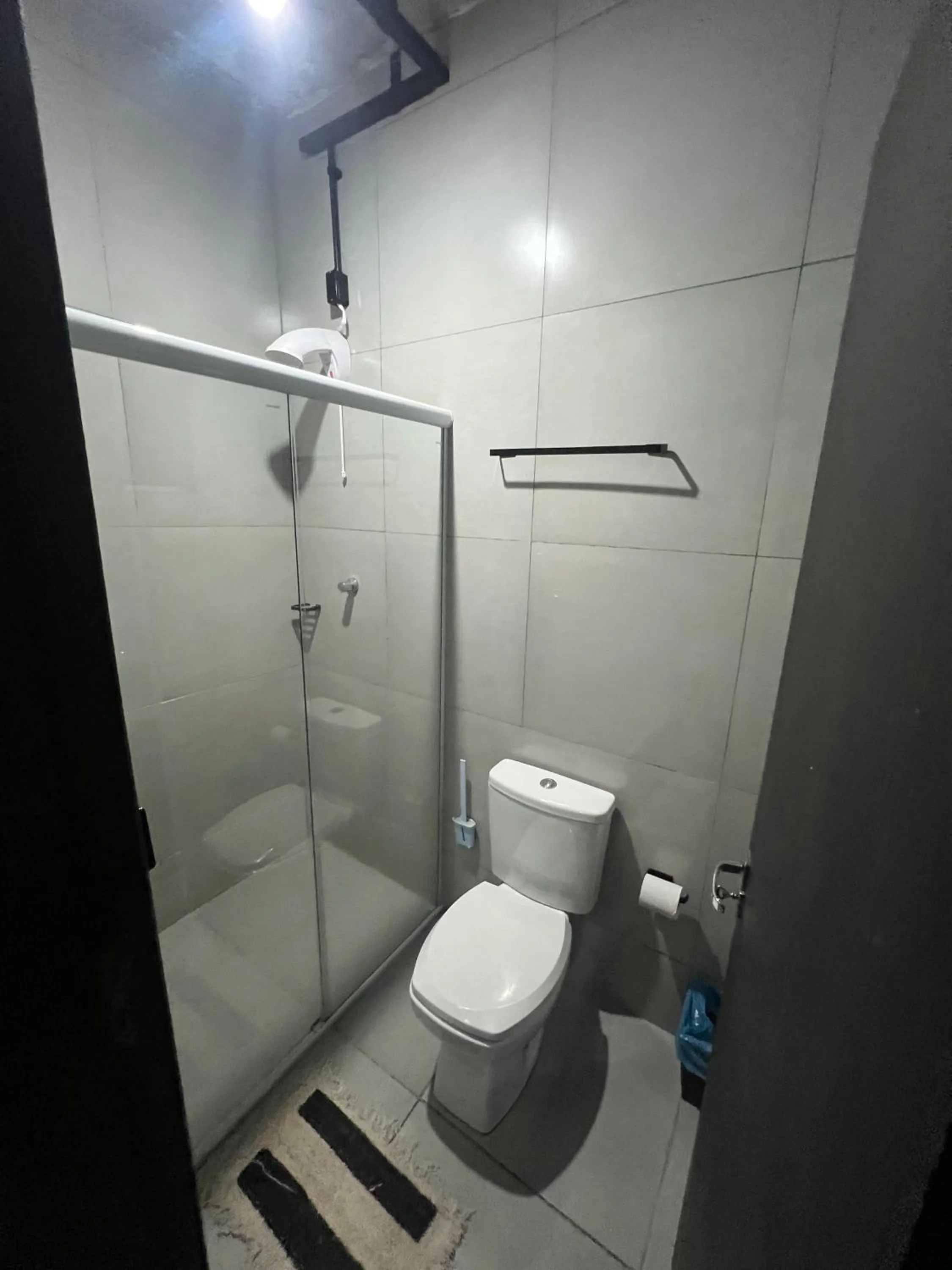 Bathroom in Esquina 8 Suítes Confort & Hostel