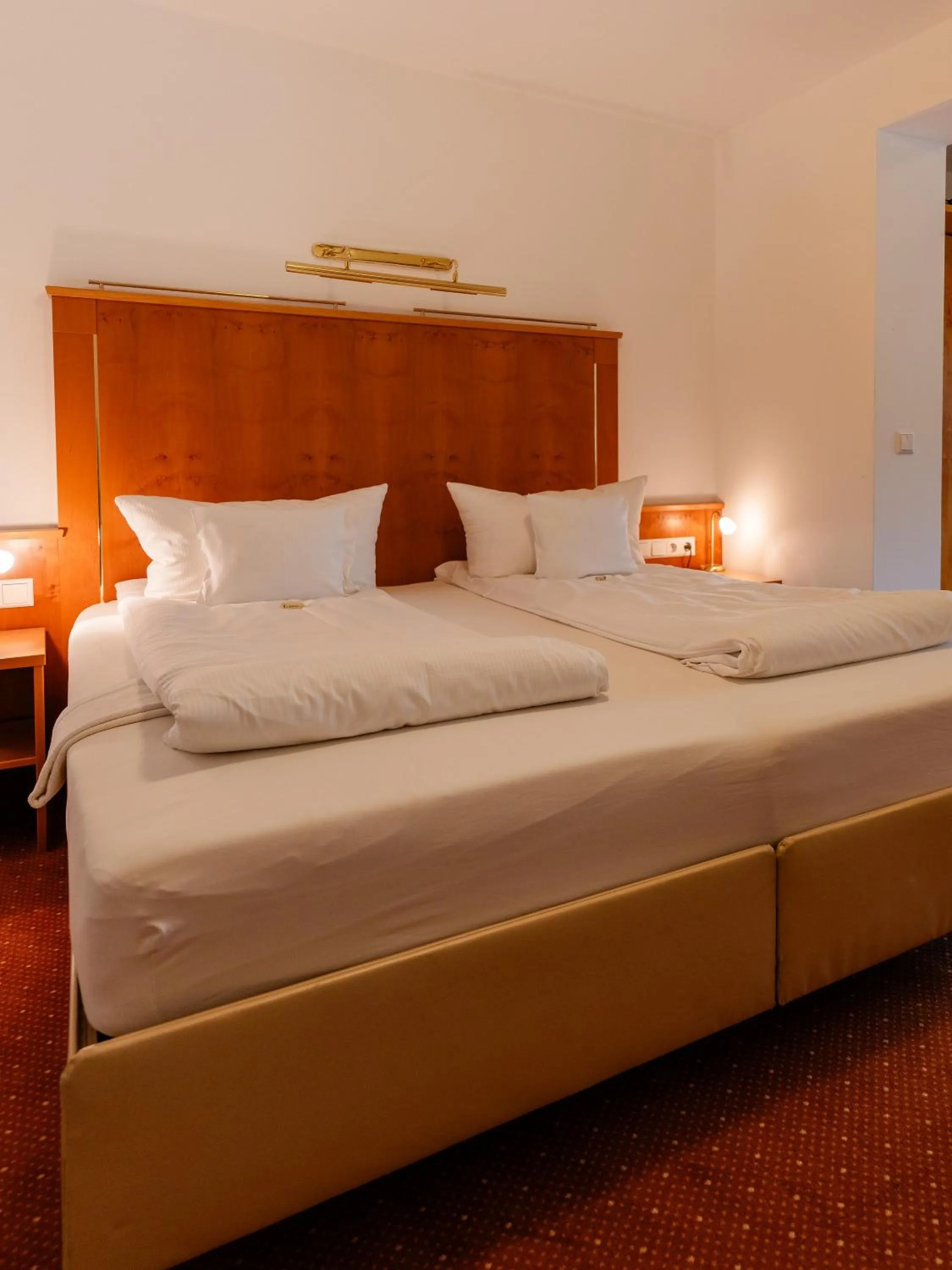 Photo of the whole room, Bed in Wellnesshotel Rothfuß mit Spa und 2 Schwimmbädern