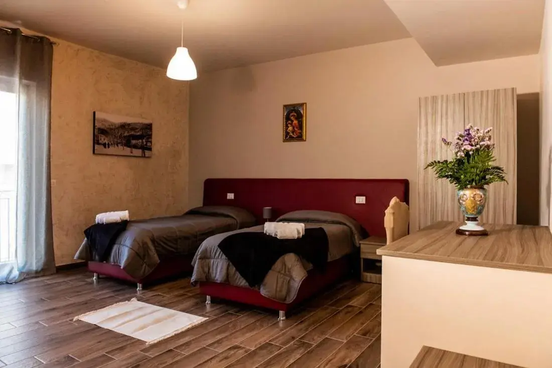 Deluxe Room (2 Adults + 1 Child) - single occupancy in Il Carro Comfortable Rooms Deluxe Room (2 Adults + 1 Child) - single occupancy in Il Carro Comfortable Rooms