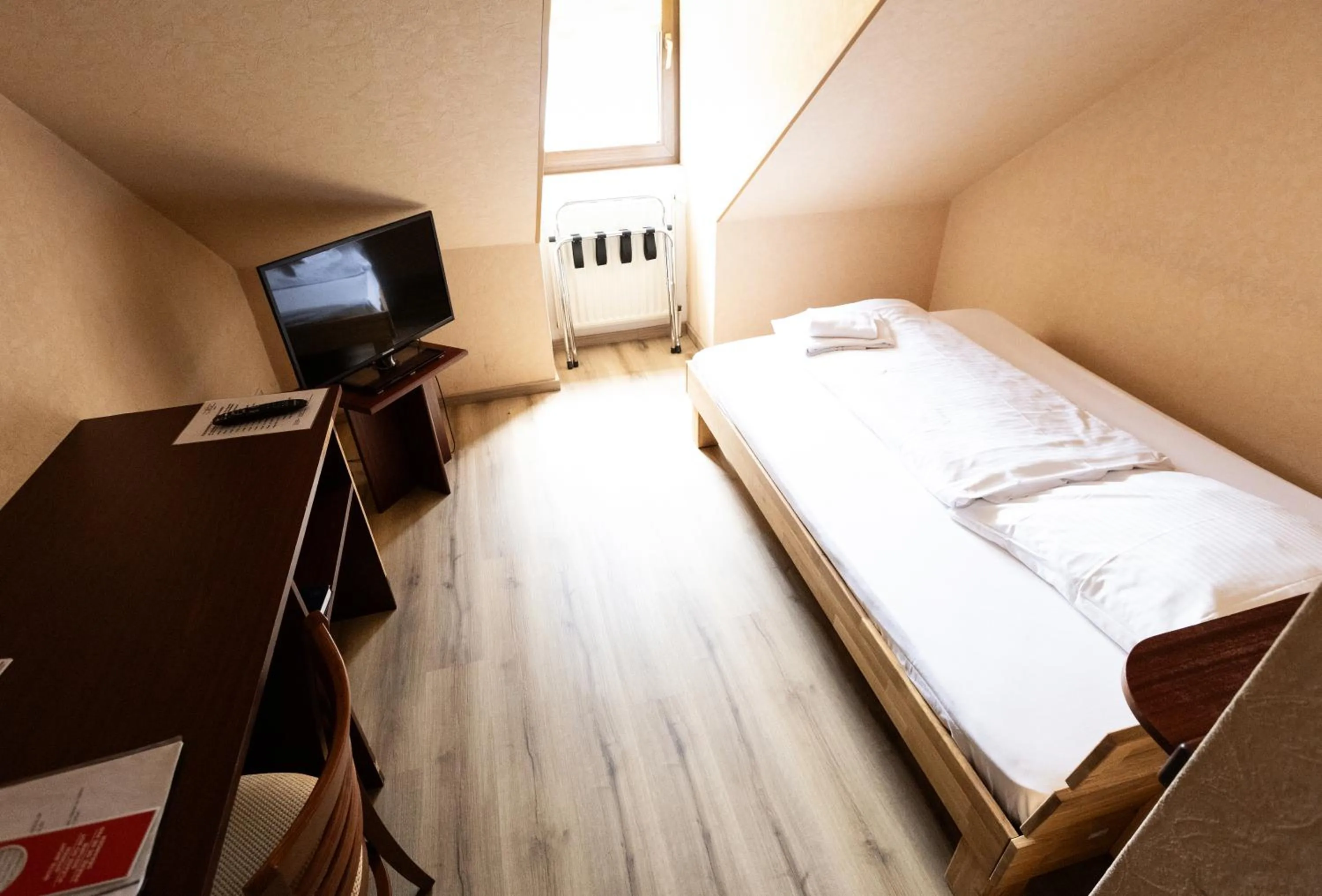 Bed in Hotel-Restaurant Zum Schwalbennest