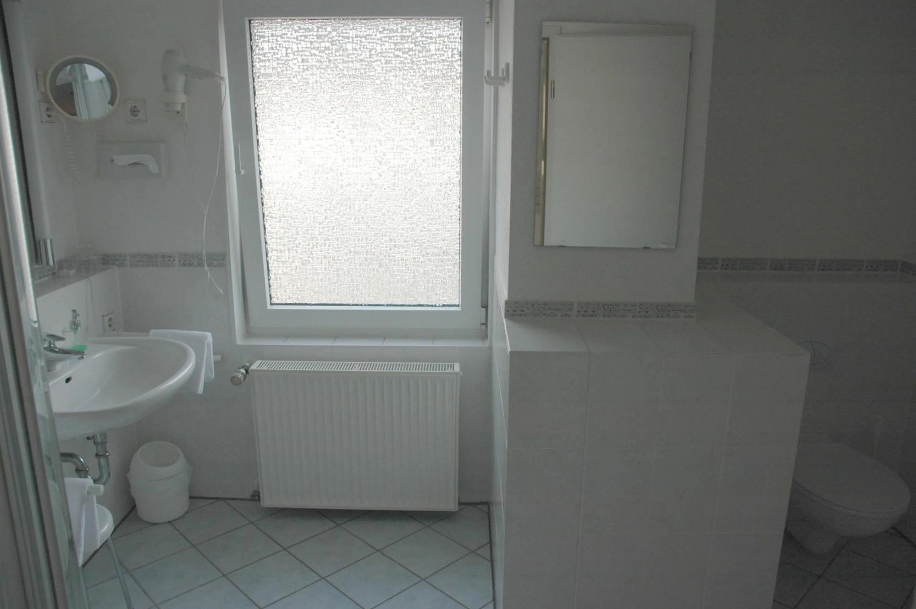 Bathroom in Parkhotel Goldlinde