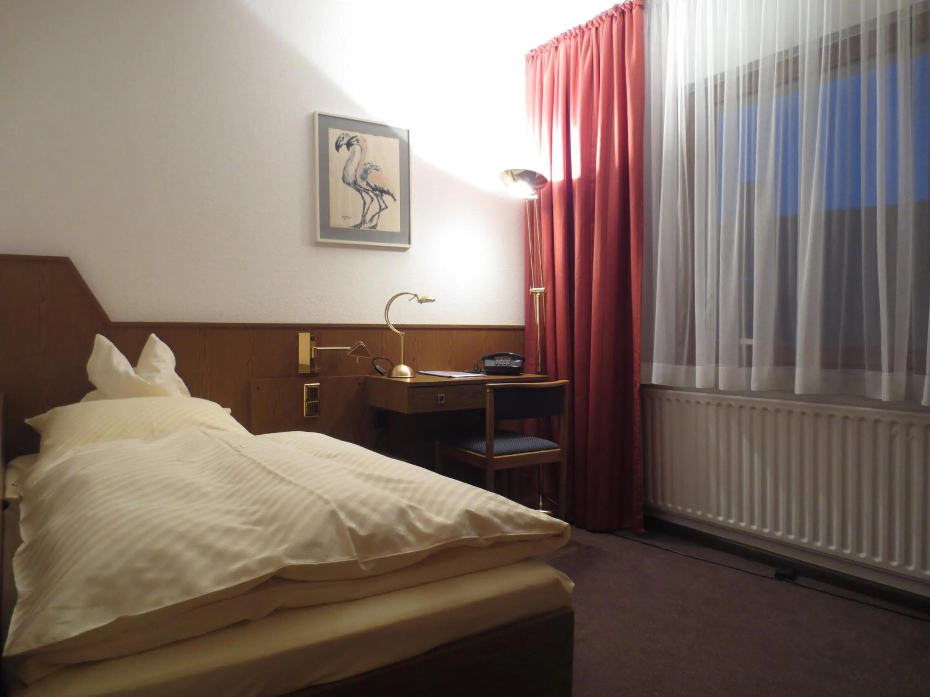 Photo of the whole room, Bed in Parkhotel Goldlinde