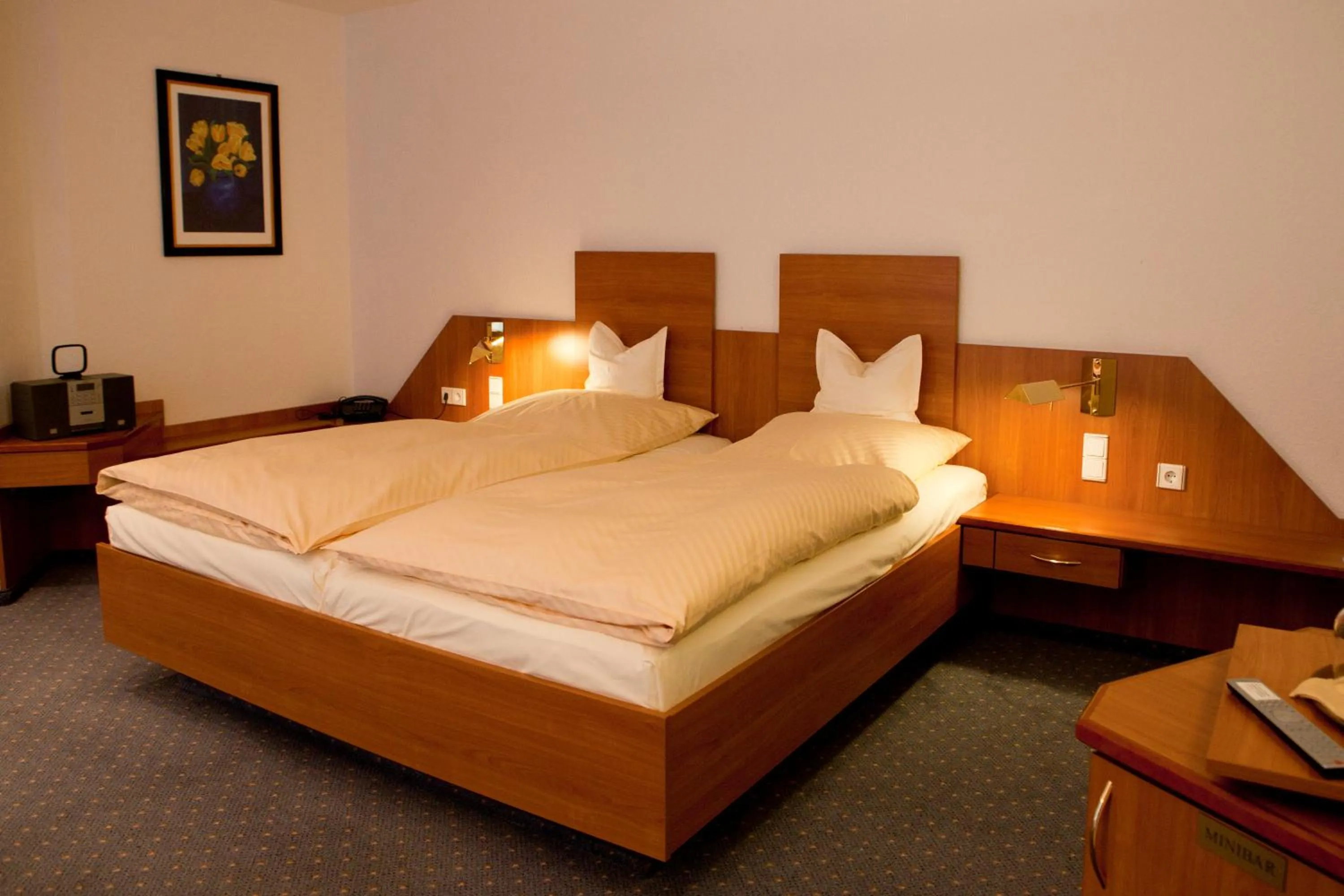 Photo of the whole room, Bed in Parkhotel Goldlinde