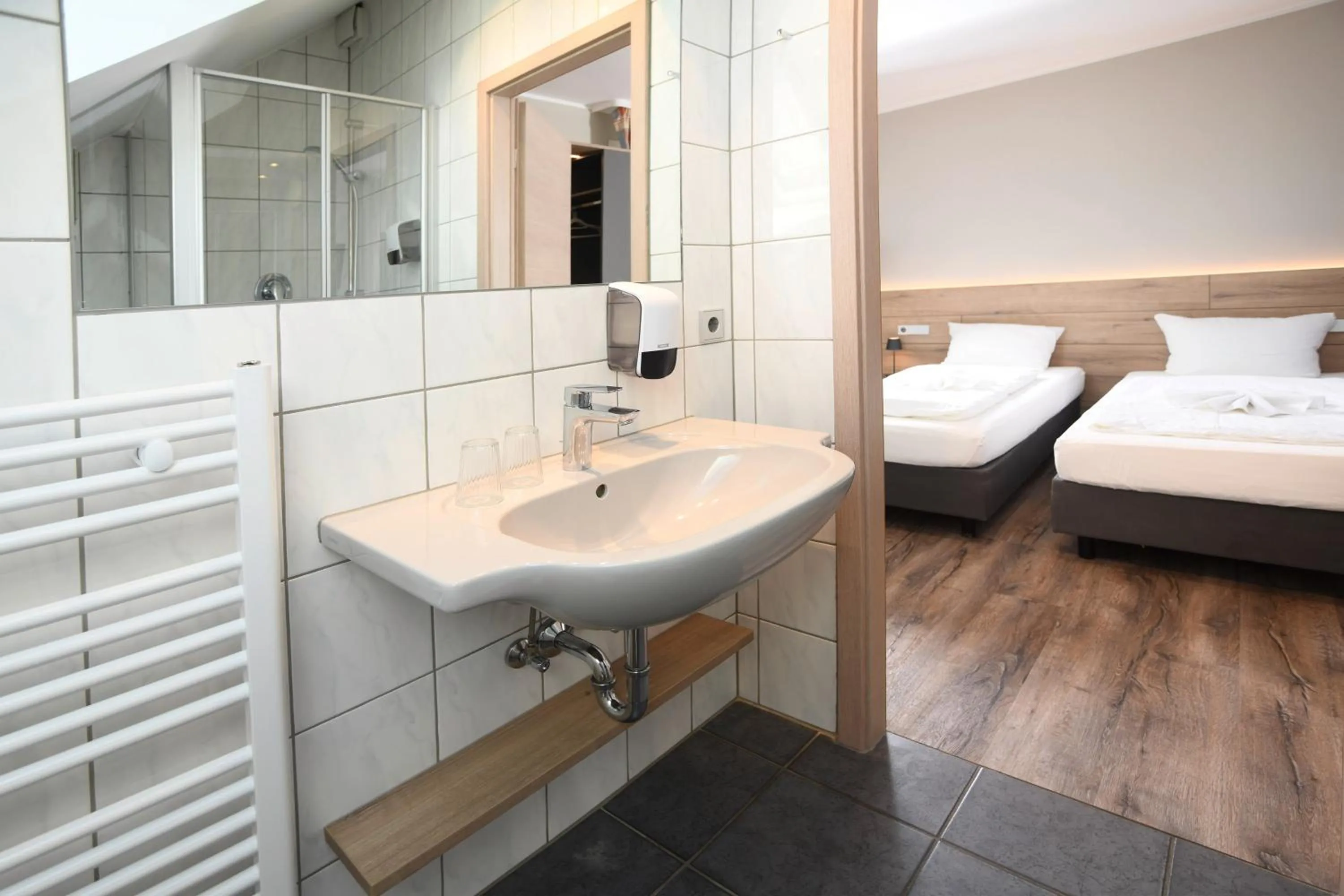 Bathroom, Bed in Hotel Kiekenstein