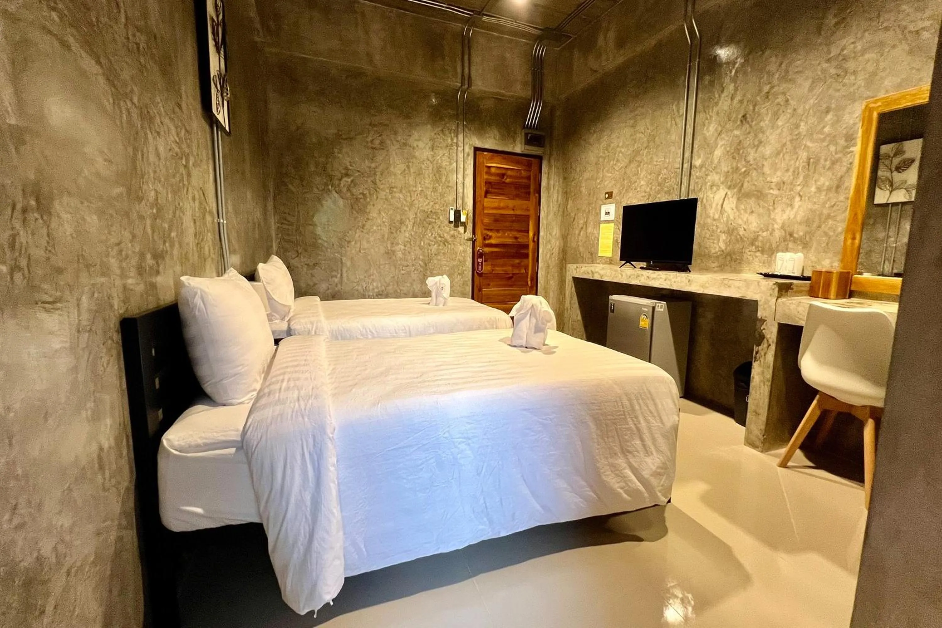 Bed in Nan Arena Place