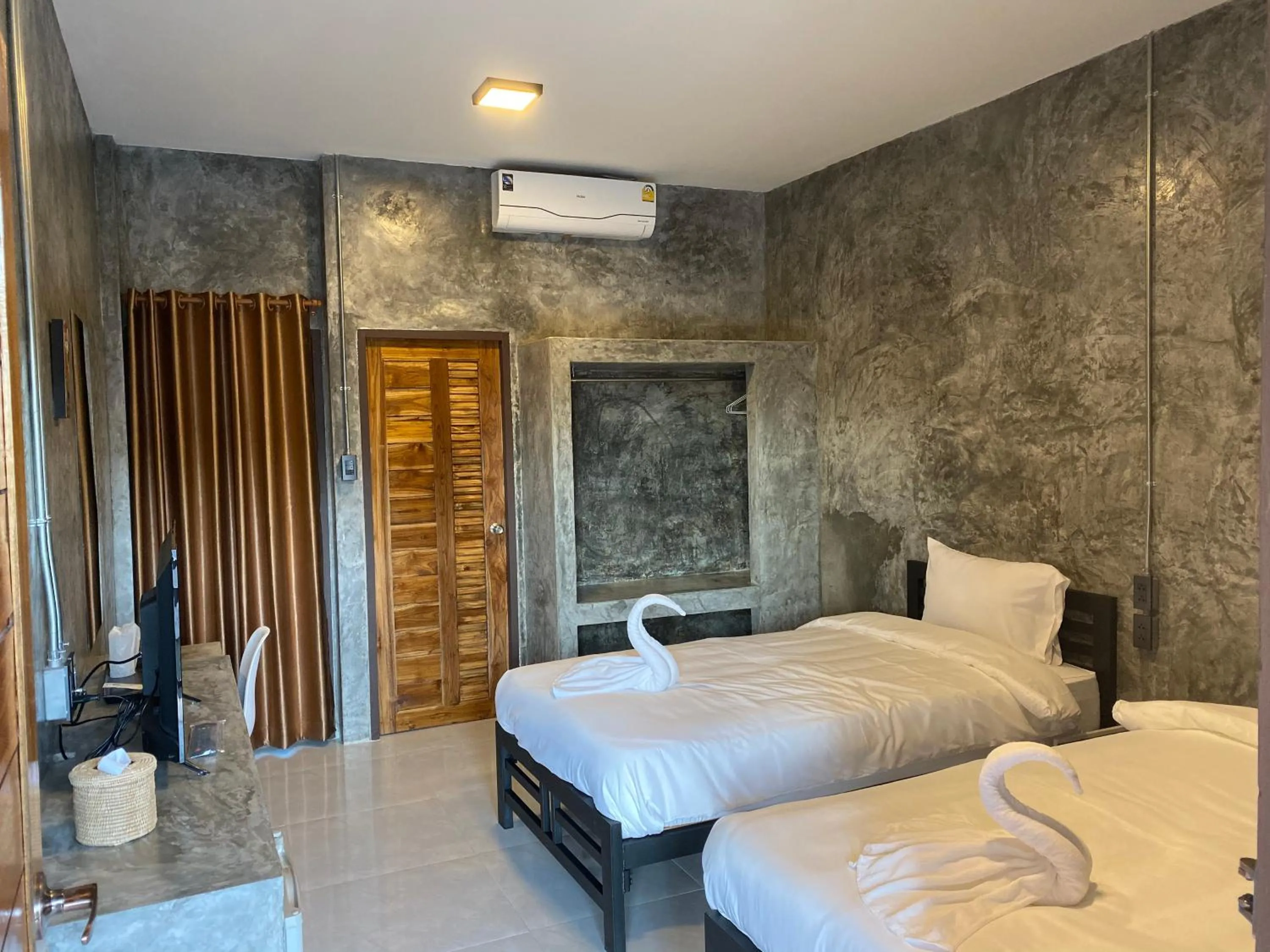 Bed in Nan Arena Place