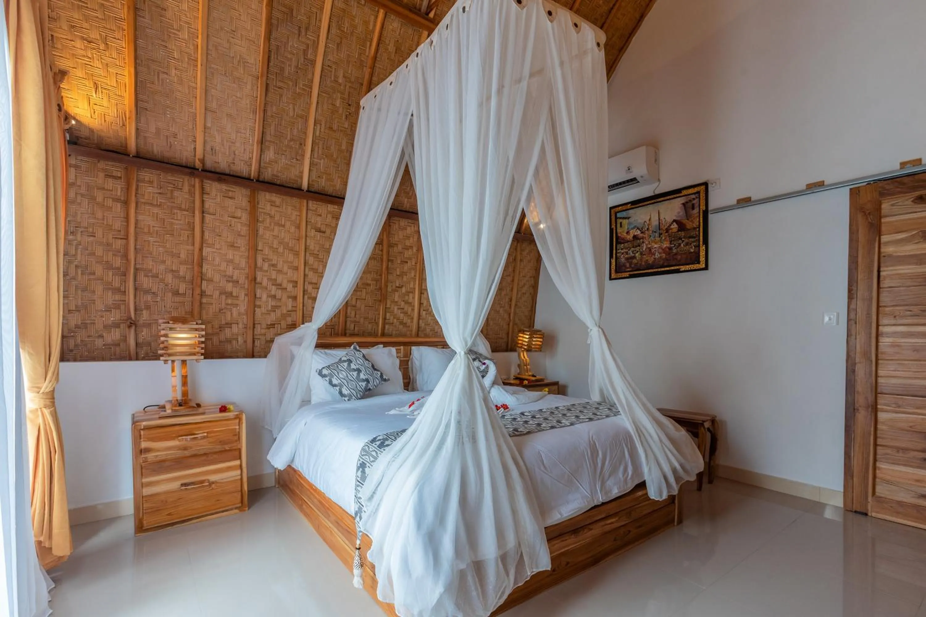Bed in Penida Sunset Ocean View Bungalows