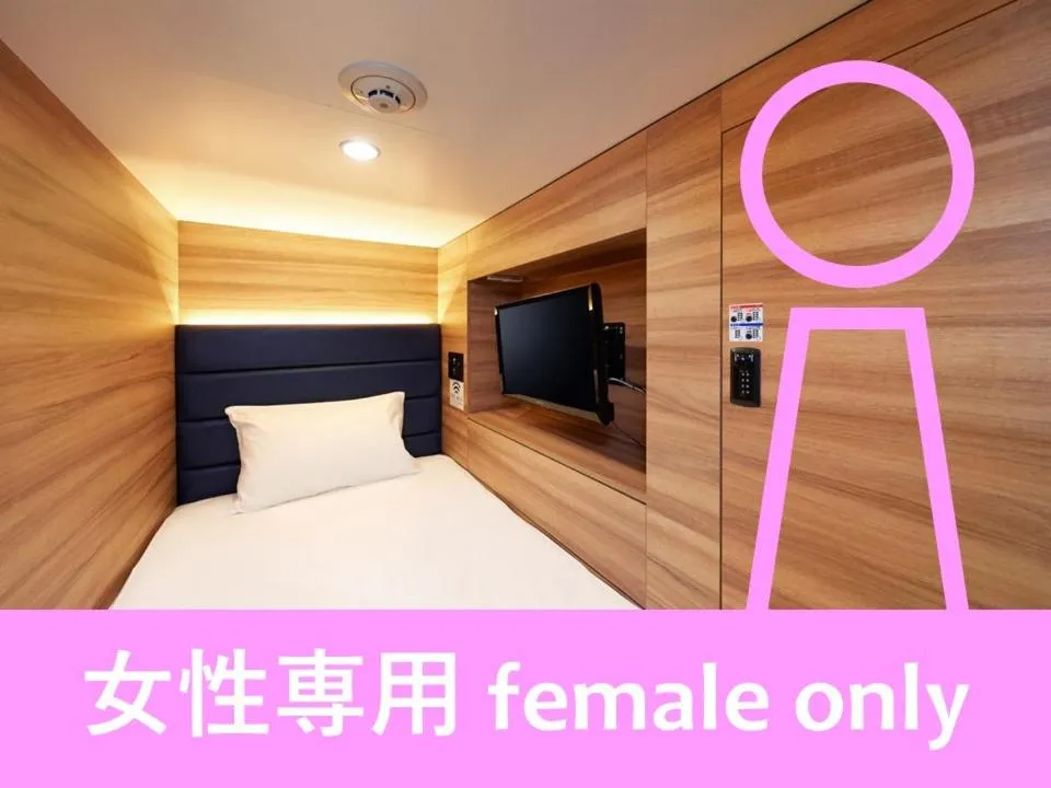 Bed in Smart Stay SHIZUKU Ueno Ekimae
