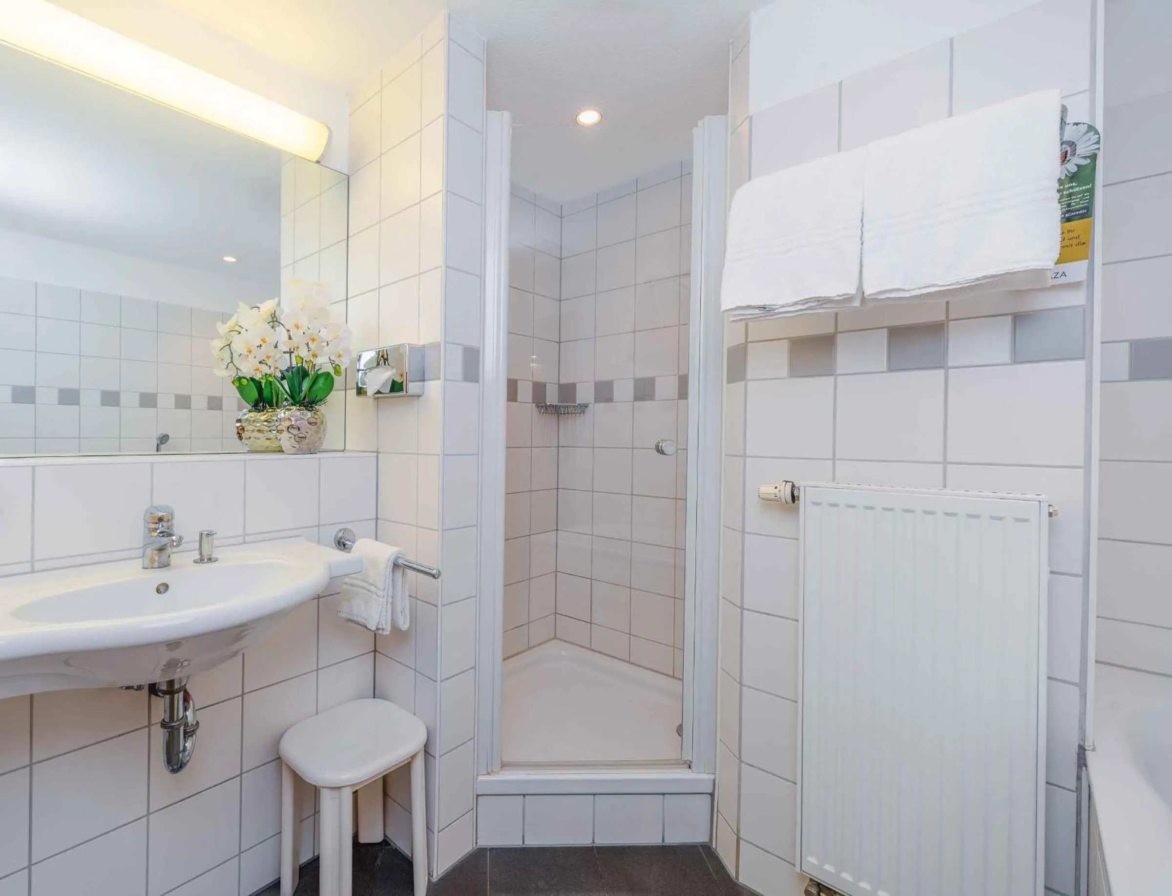 Bathroom in PLAZA INN Köln Pulheim