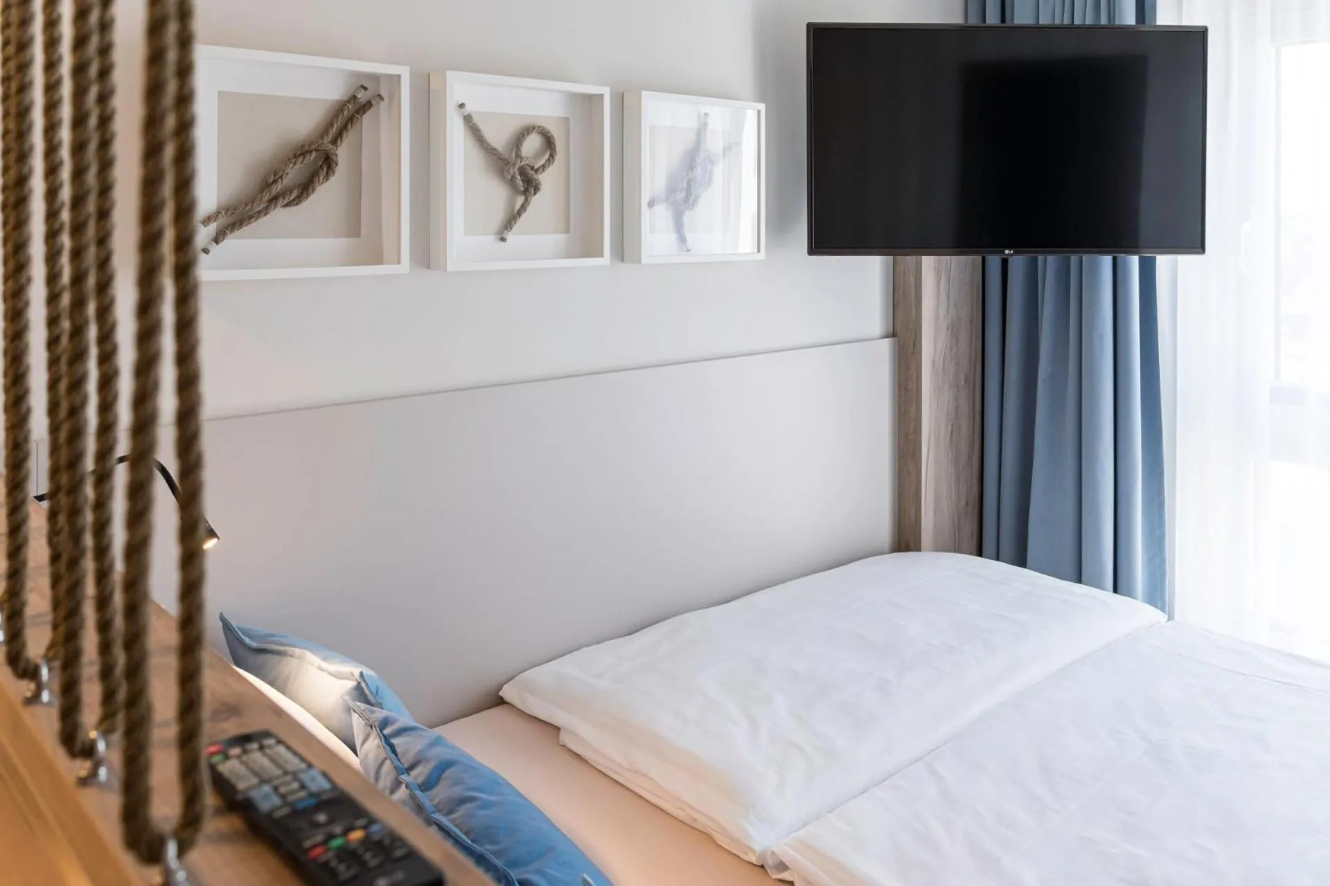 Photo of the whole room, Bed in WIROtel Warnemünde