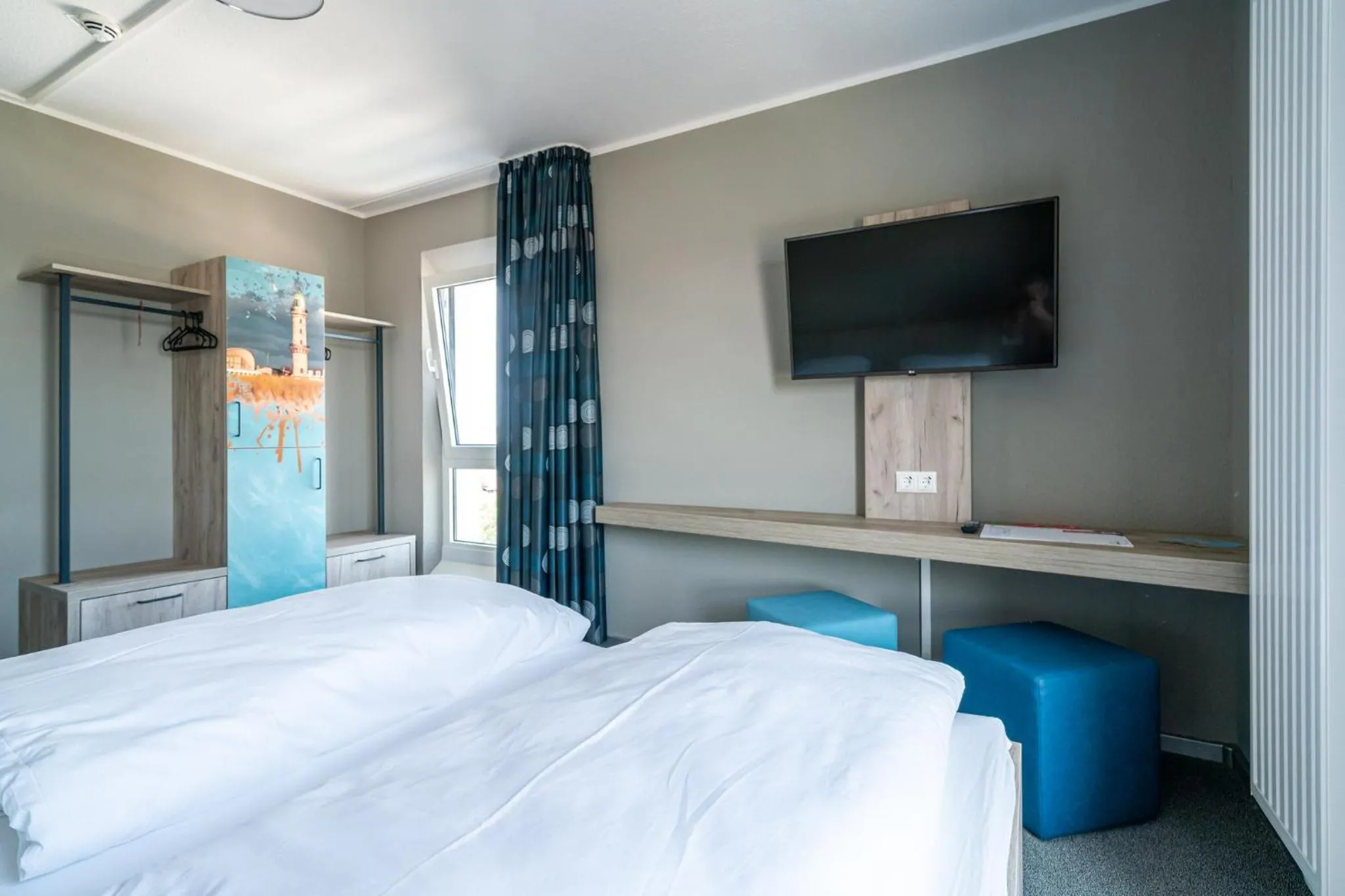 Photo of the whole room, Bed in WIROtel Warnemünde