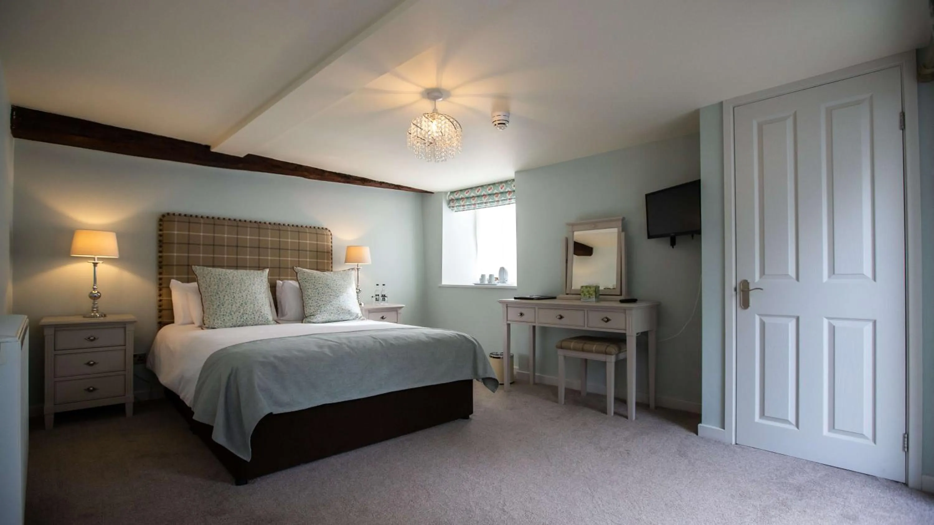 Bed in The Wyndham Hotel