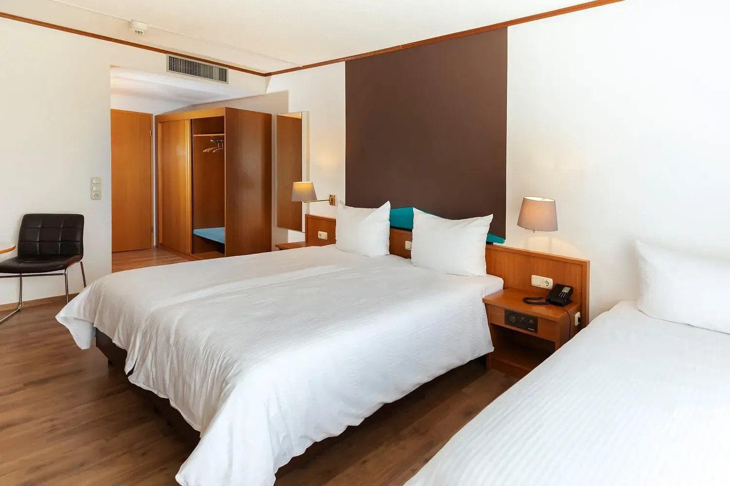 Bed in ACHAT Hotel Frankfurt Maintal Bed in ACHAT Hotel Frankfurt Maintal