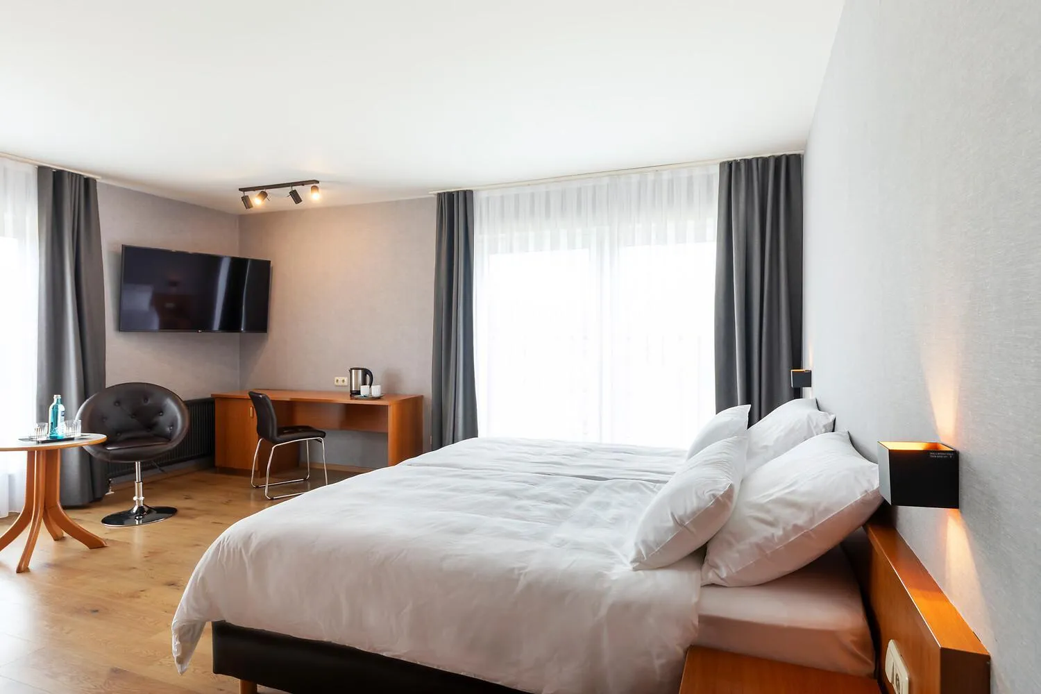 Bed in ACHAT Hotel Frankfurt Maintal