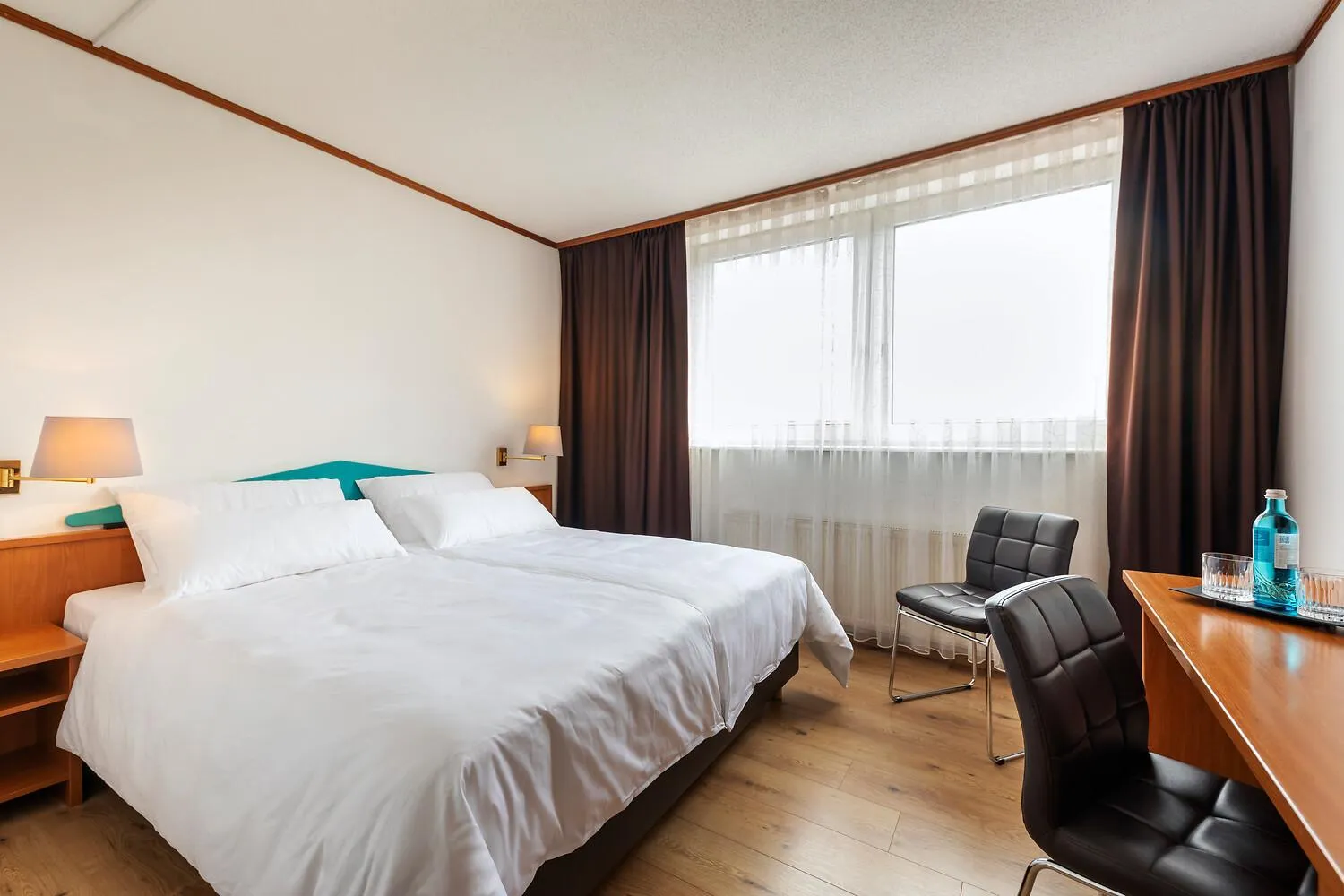 Bed in ACHAT Hotel Frankfurt Maintal