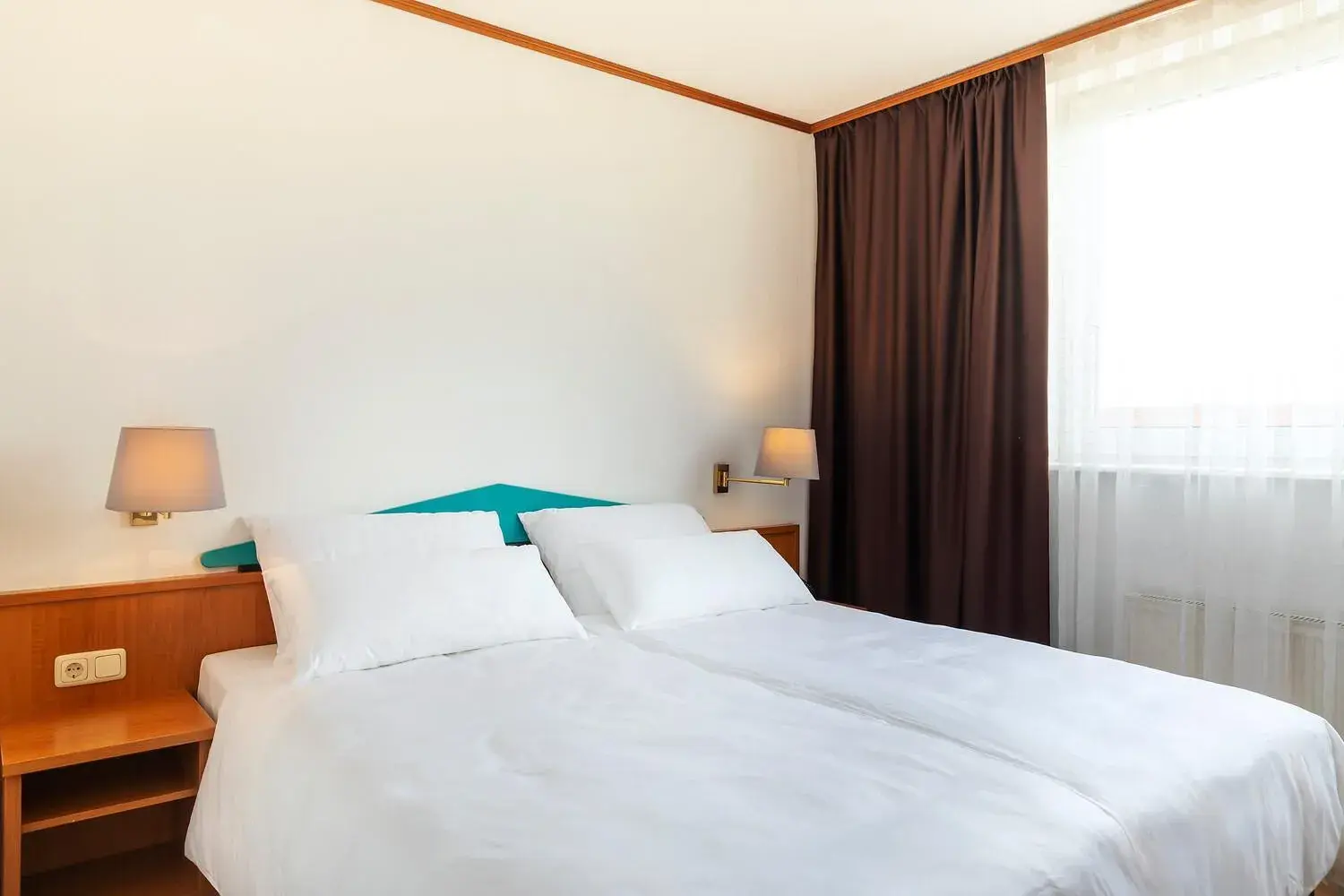 Bed in ACHAT Hotel Frankfurt Maintal Bed in ACHAT Hotel Frankfurt Maintal