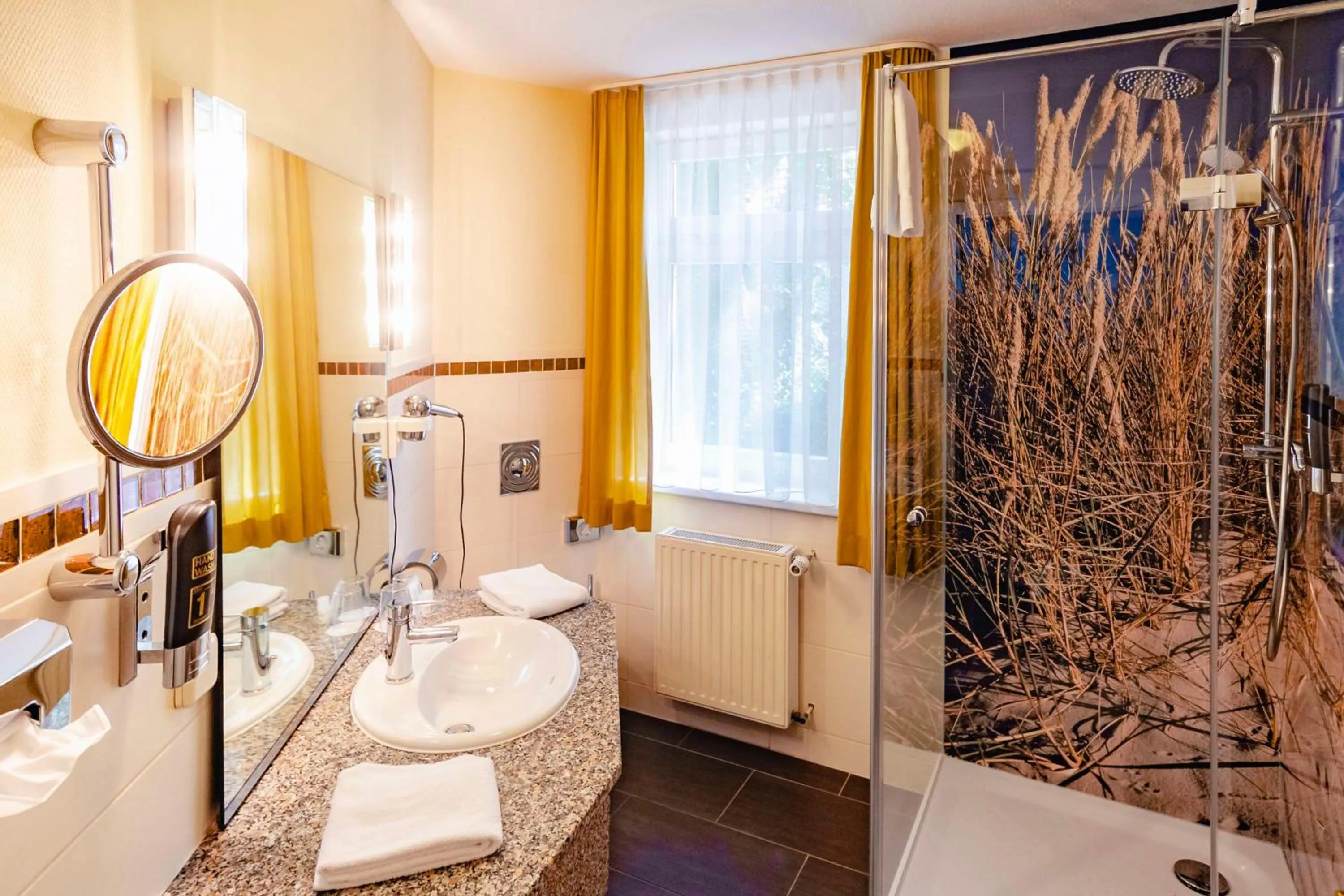 Bathroom in Best Western Plus Ostseehotel Waldschloesschen