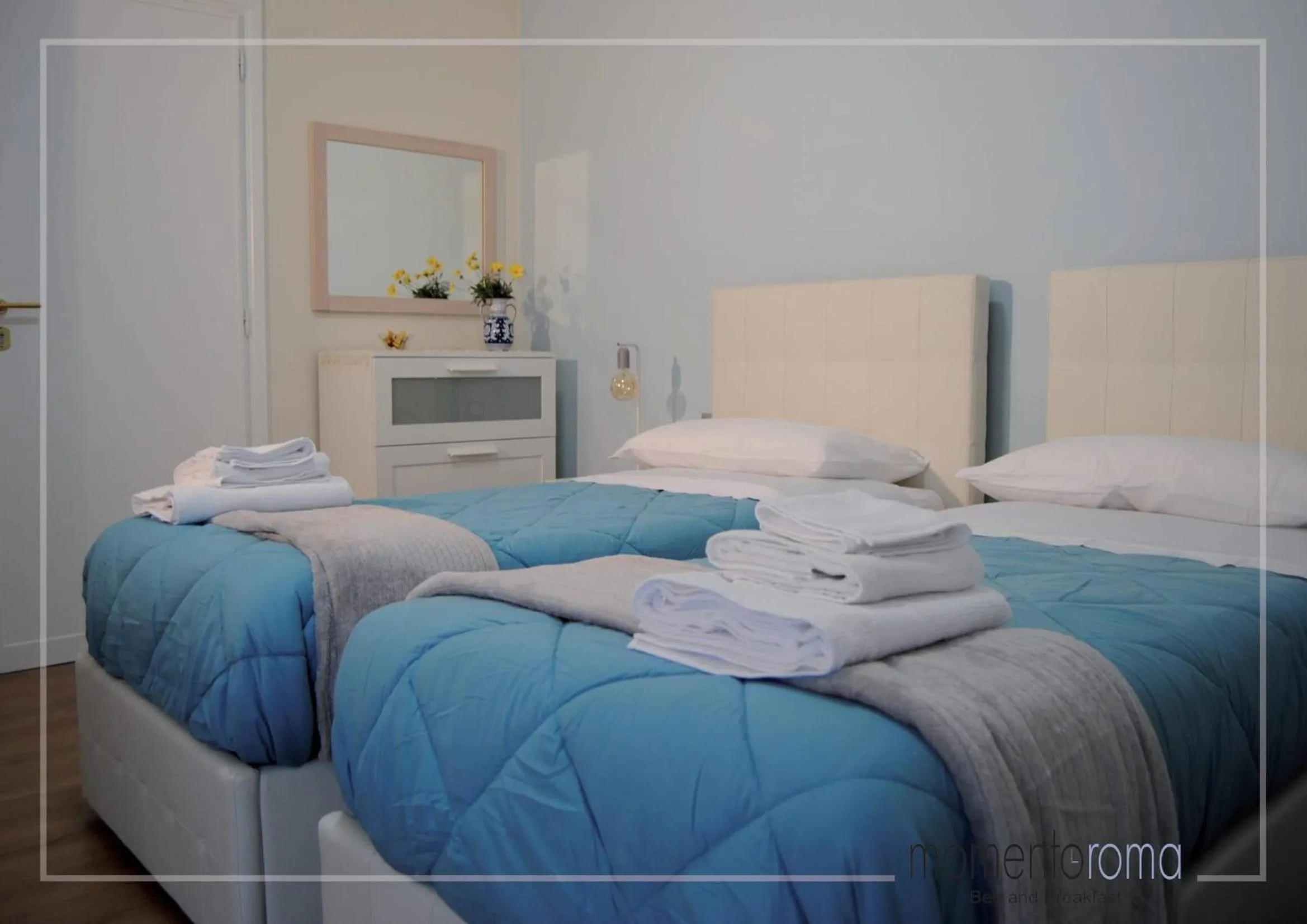 Bed in Momentoroma b&b