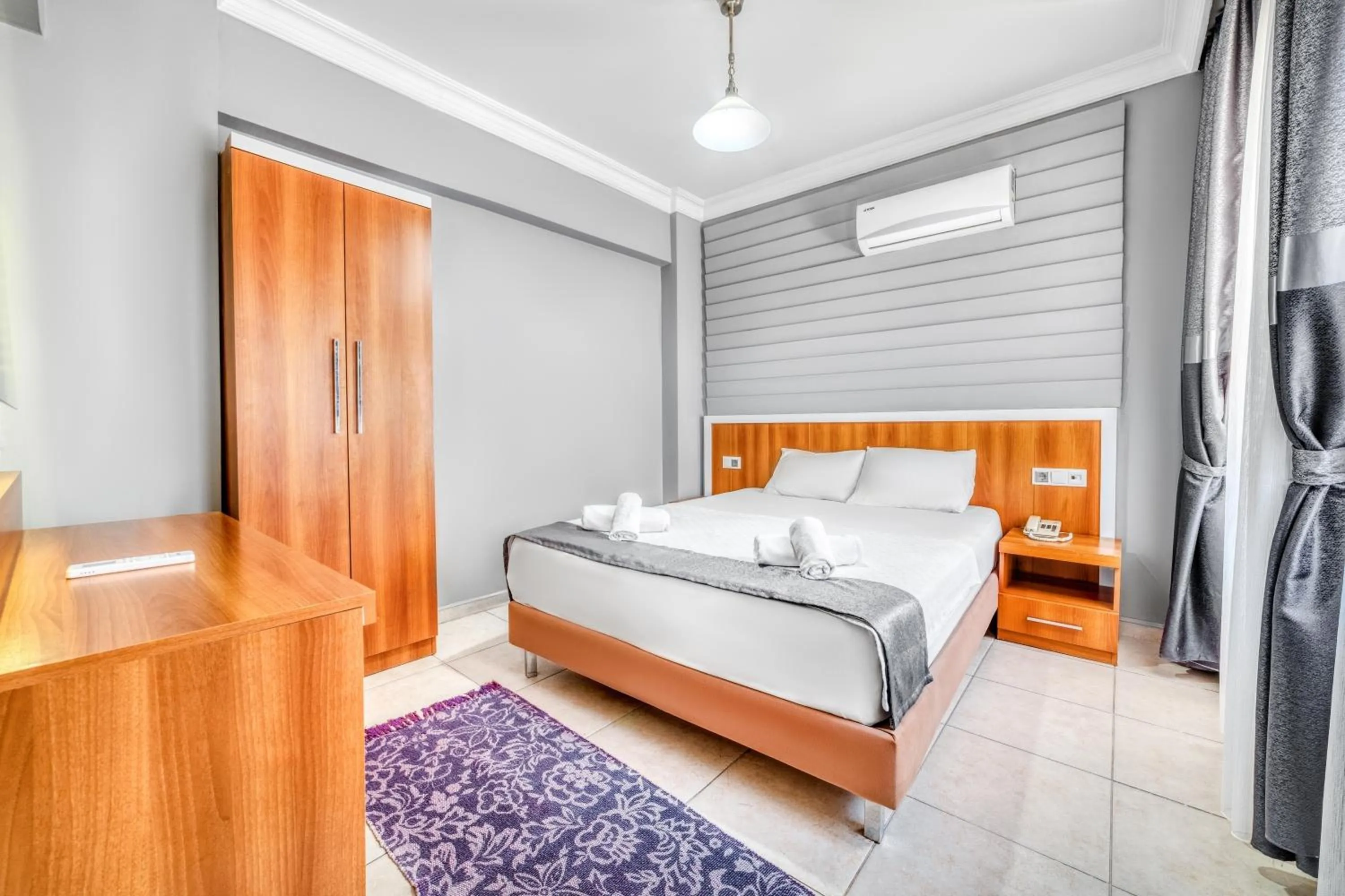 Bed in Kleopatra ICARIA Apart Hotel