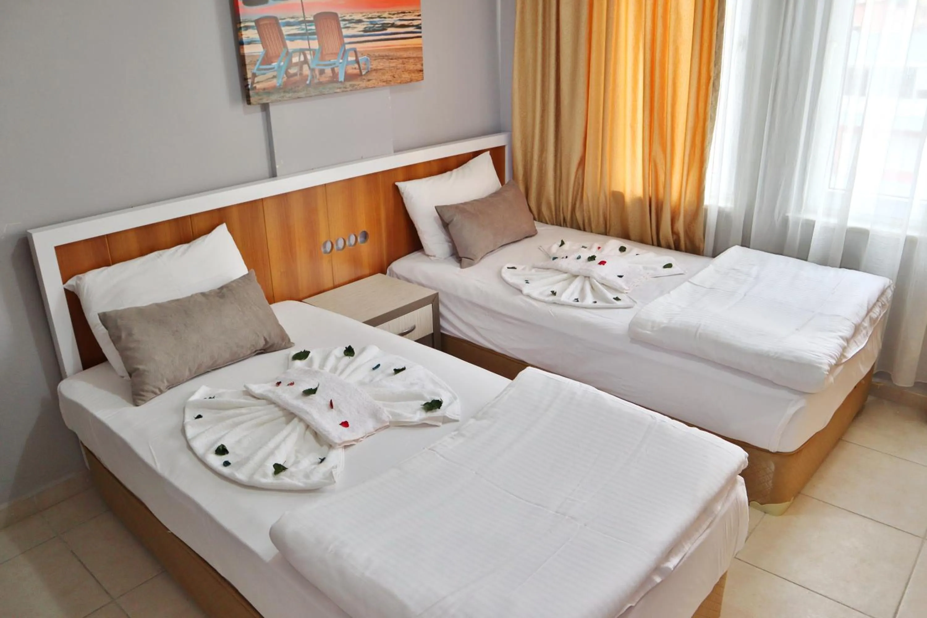 Bed in Kleopatra ICARIA Apart Hotel