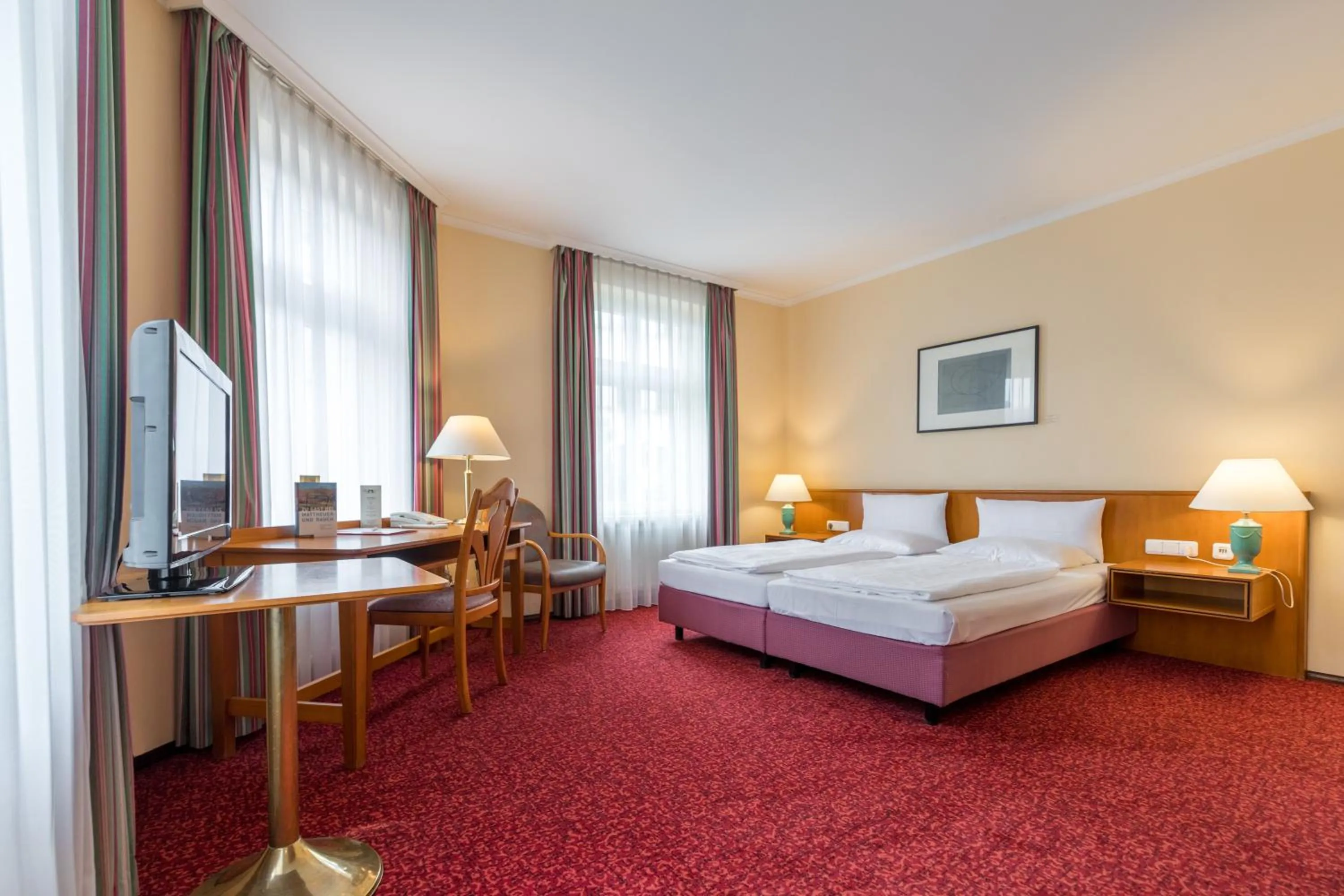 Photo of the whole room, Bed in Galerie Hotel Leipziger Hof