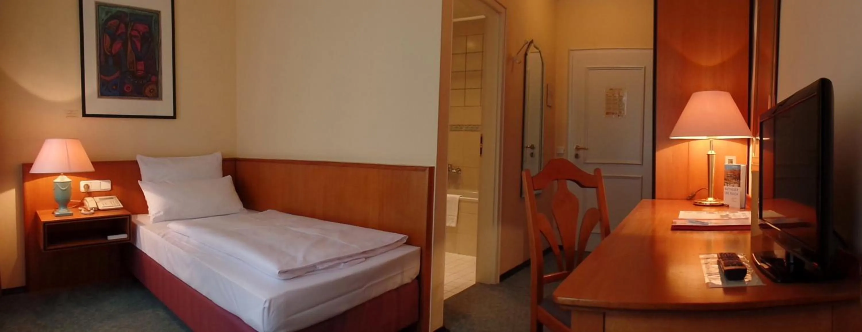 Photo of the whole room, Bed in Galerie Hotel Leipziger Hof