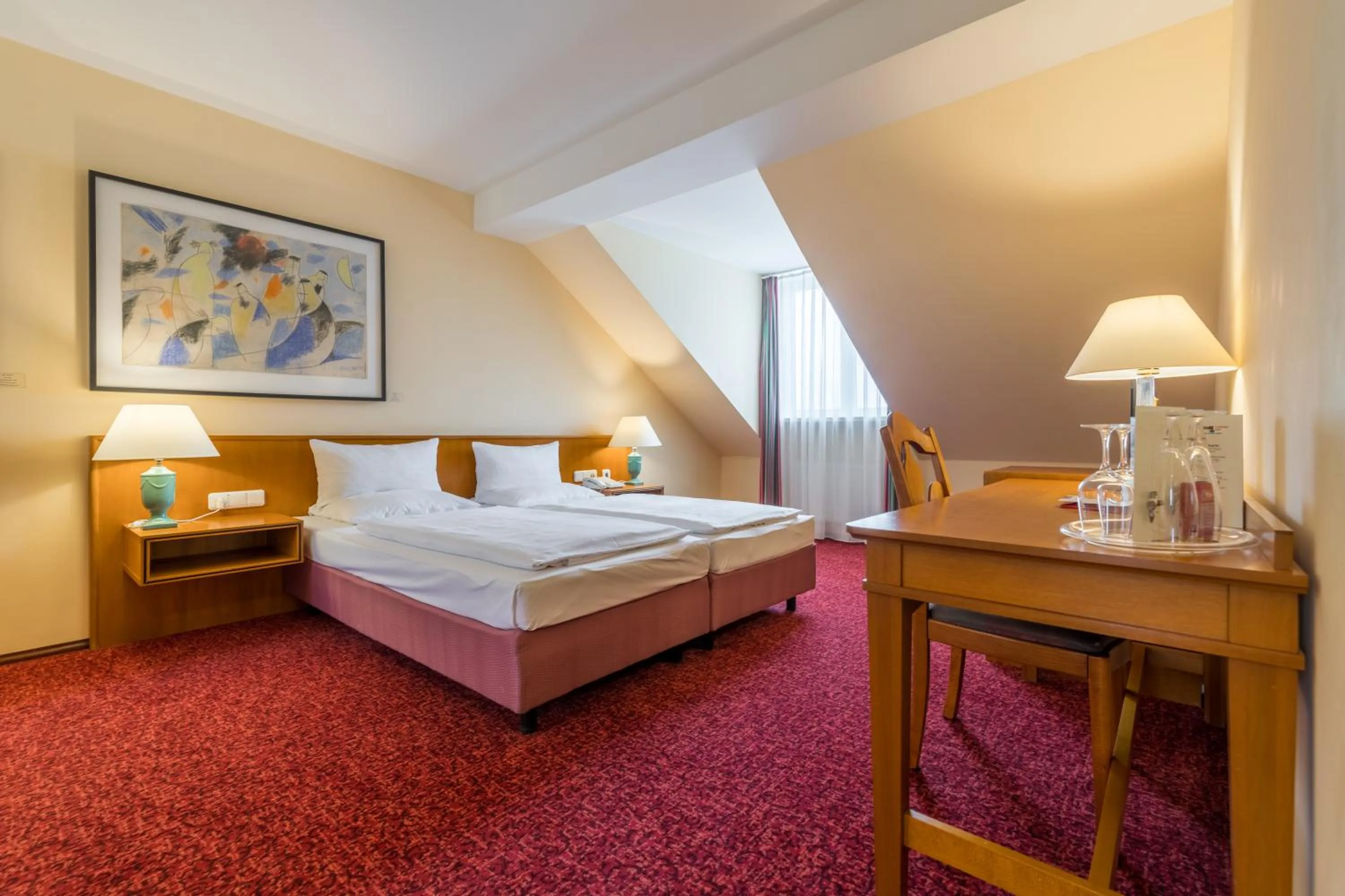 Photo of the whole room, Bed in Galerie Hotel Leipziger Hof