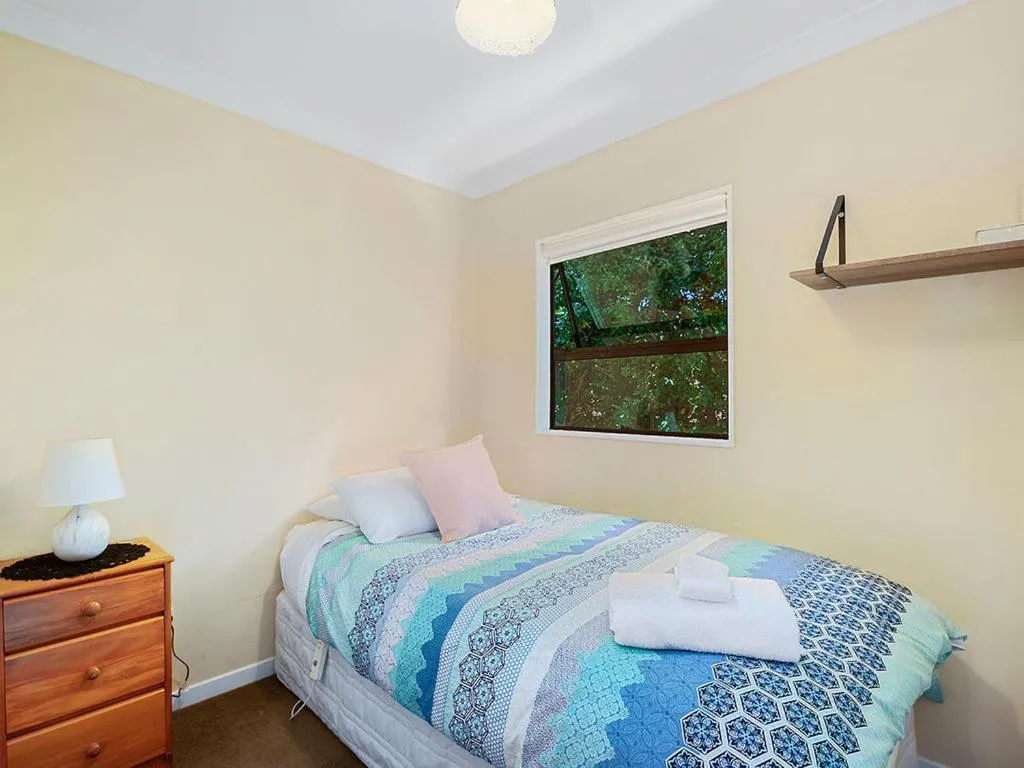 Bed in Acacia Bay Getaway - Lake Taupo Holiday Home