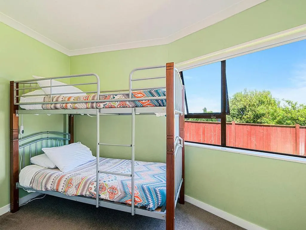 Bed in Acacia Bay Getaway - Lake Taupo Holiday Home