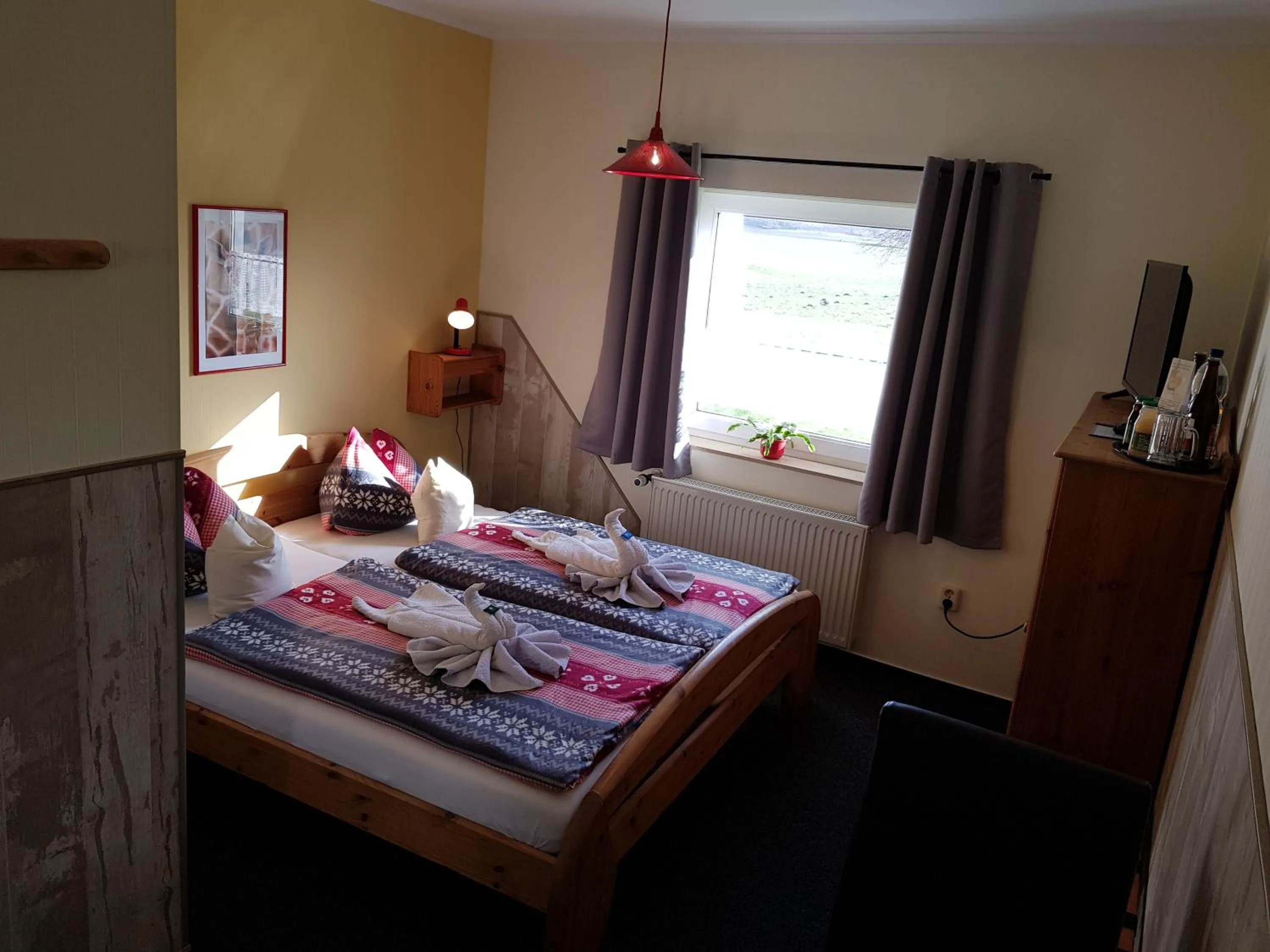 Photo of the whole room, Bed in Landhotel Pathes Hof