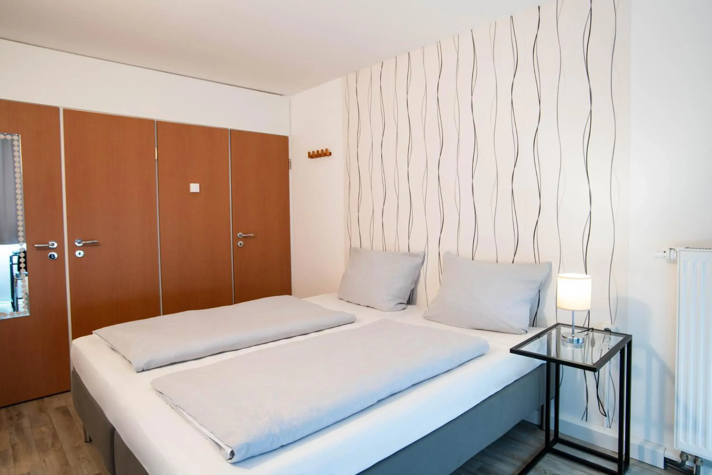 Photo of the whole room, Bed in BeeVillage Messehotel Hannover Laatzen Photo of the whole room, Bed in BeeVillage Messehotel Hannover Laatzen