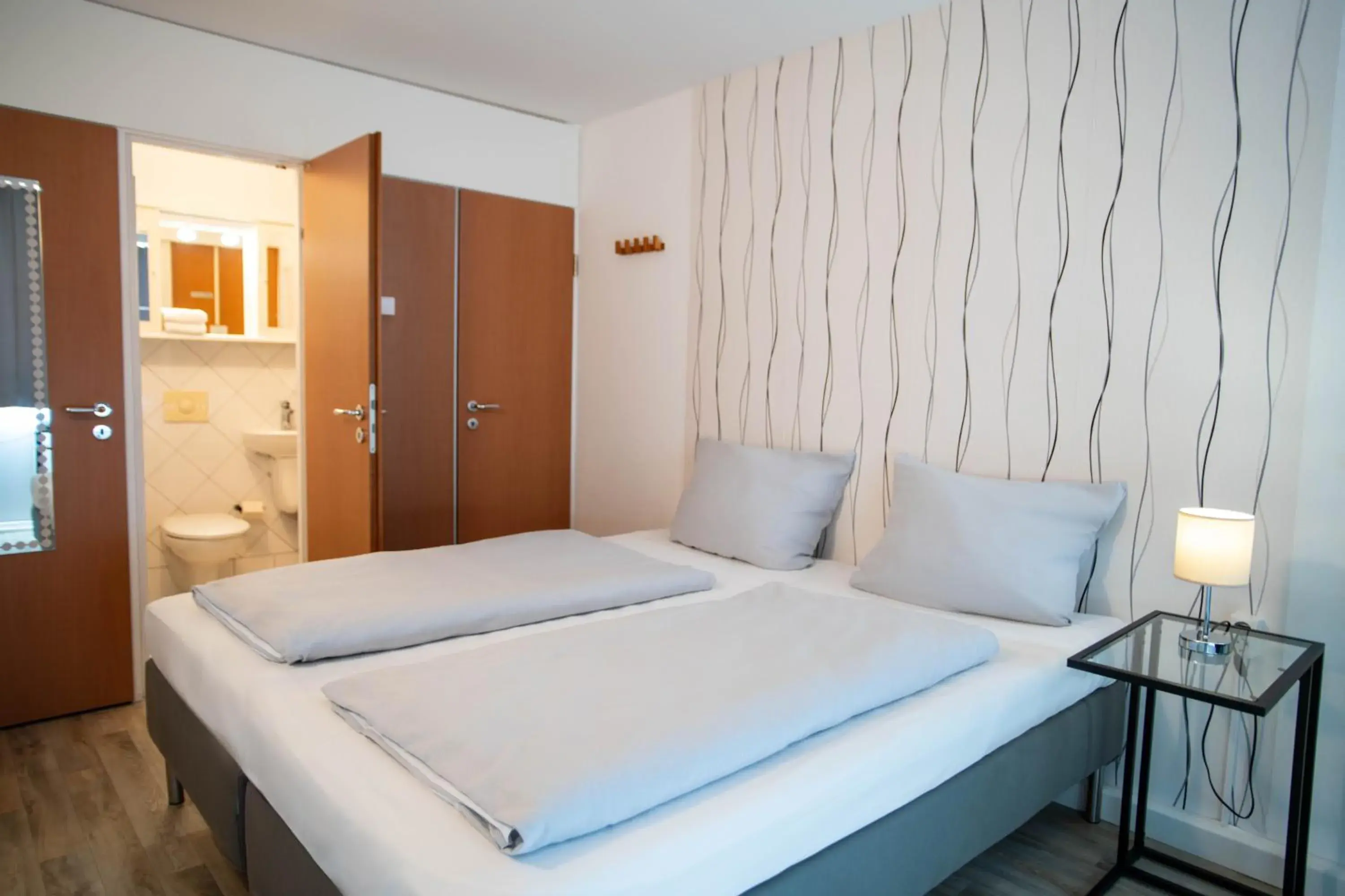 Photo of the whole room, Bed in BeeVillage Messehotel Hannover Laatzen Photo of the whole room, Bed in BeeVillage Messehotel Hannover Laatzen