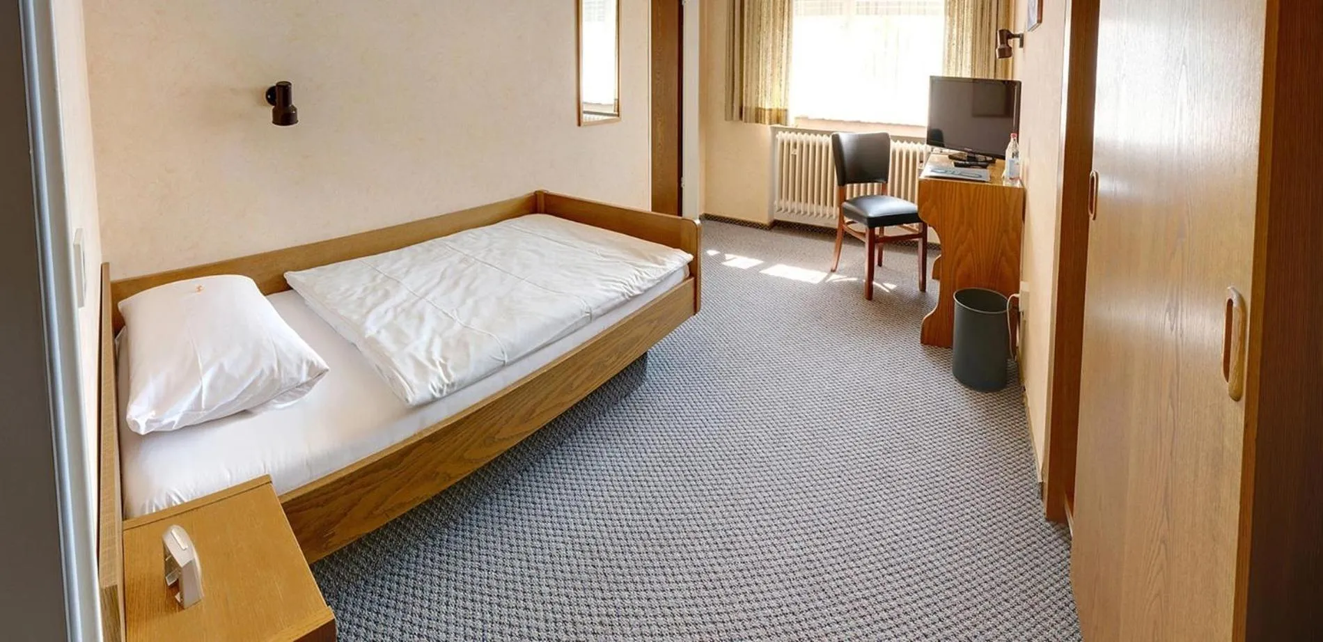 Bed in Hotel Keinath Stuttgart