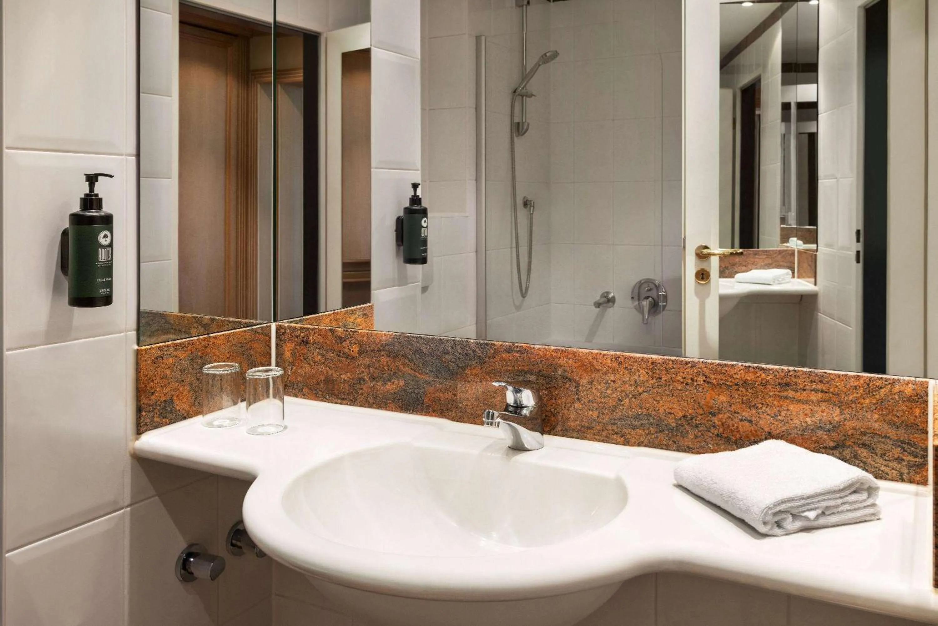 Bathroom in Amedia Hotel & Suites Leipzig, Trademark Collection by Wyndham