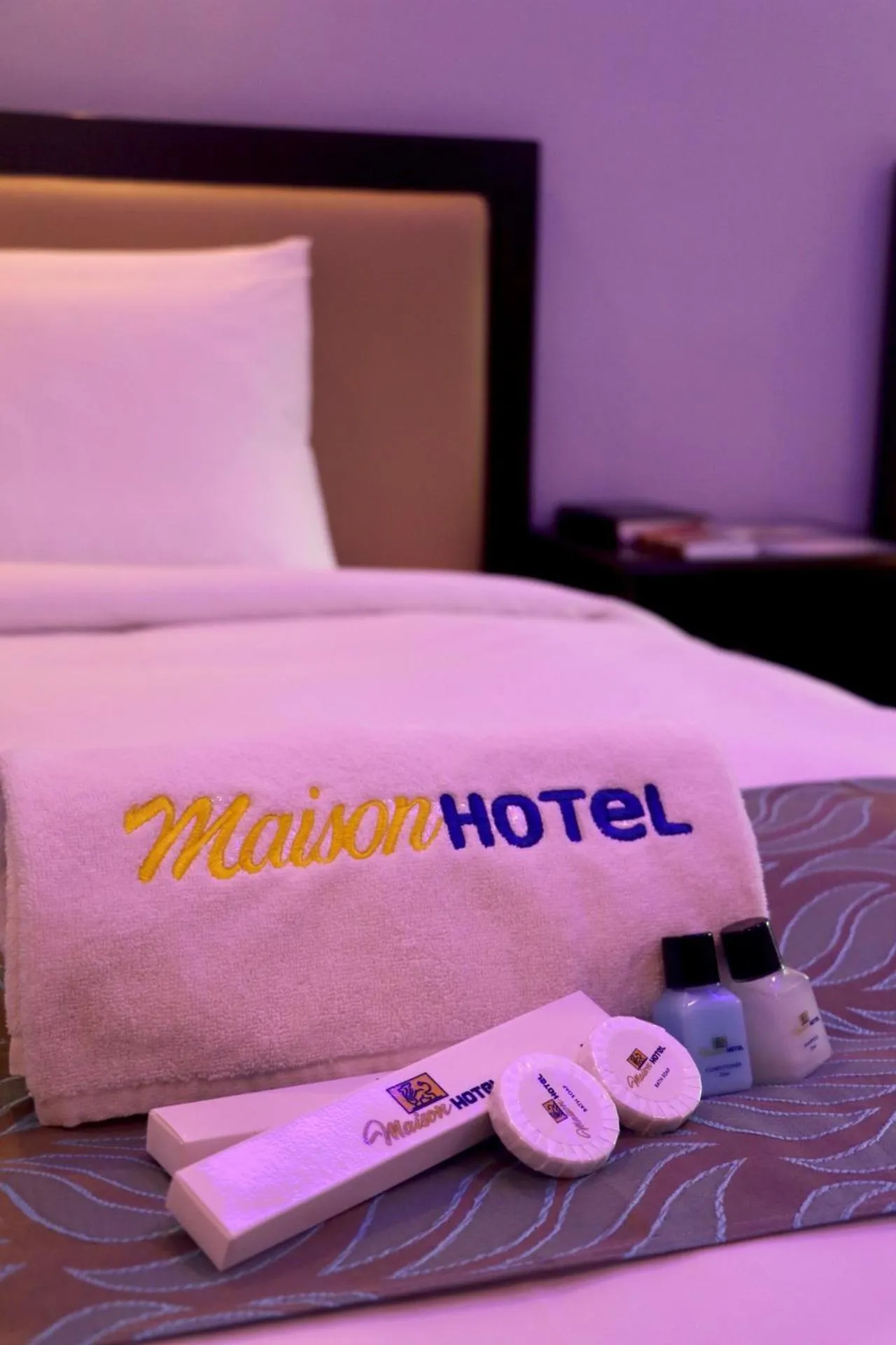 Bed in MAISON HOTEL