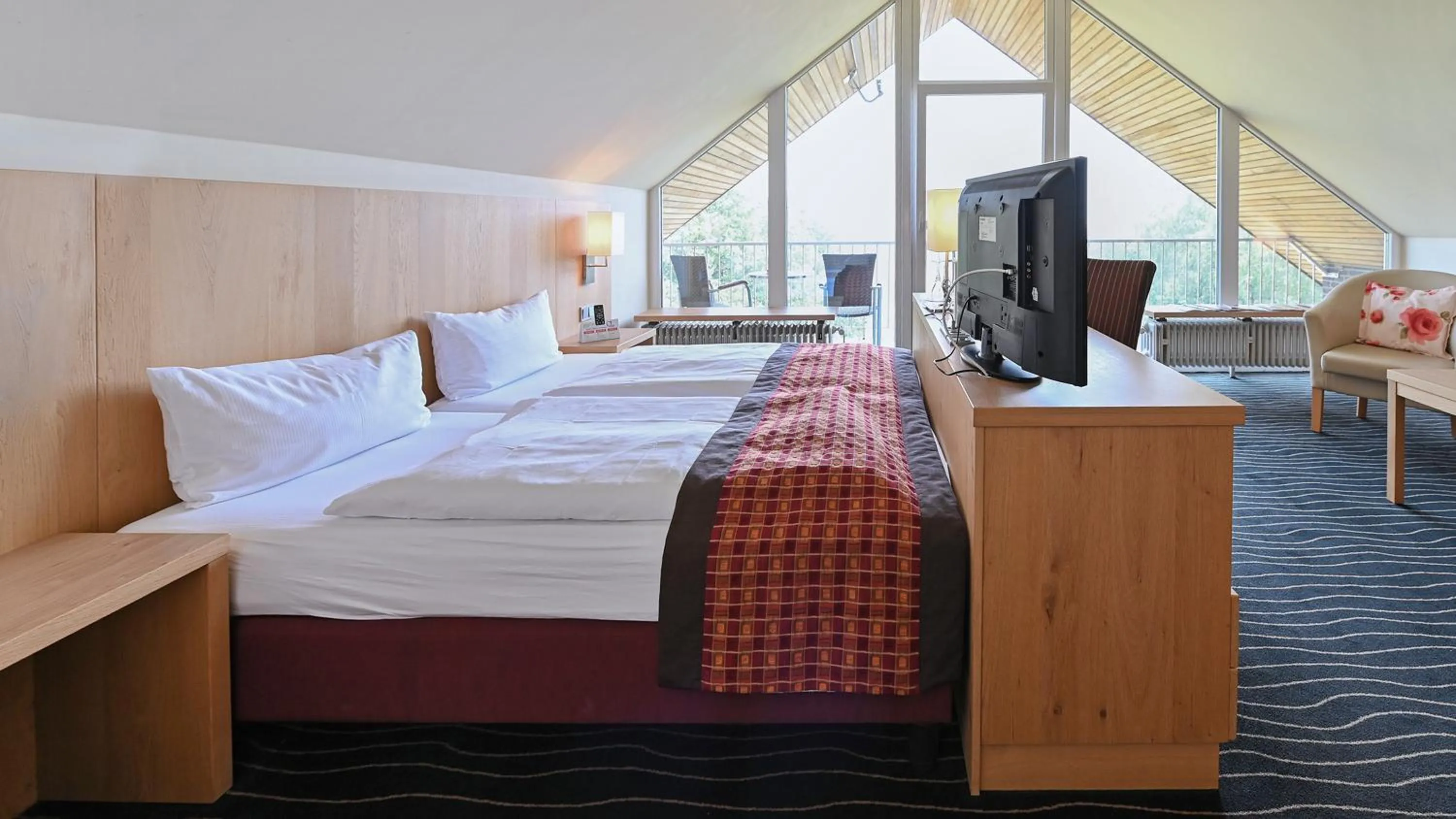 Photo of the whole room, Bed in Berghotel Hohe Mark