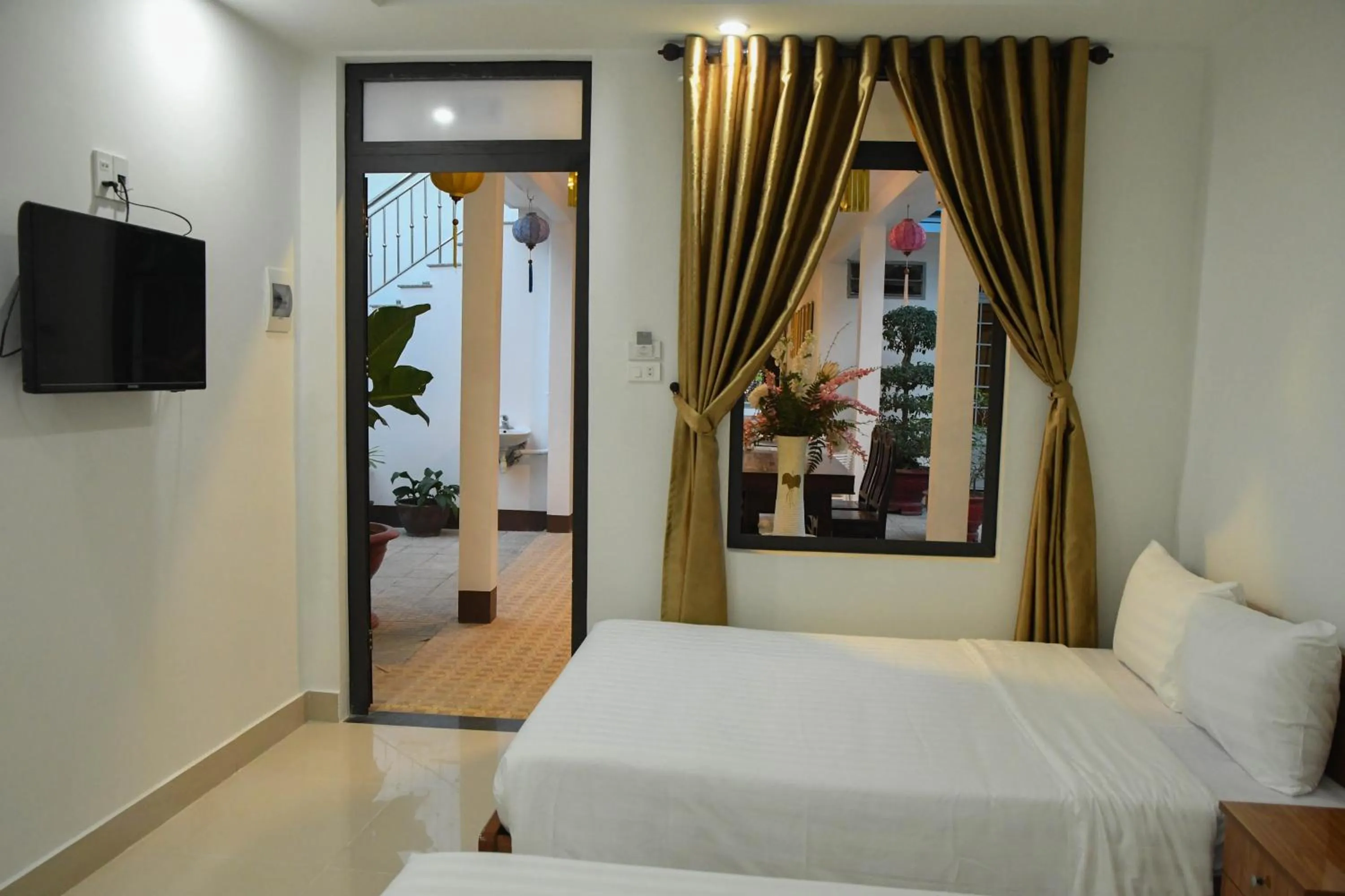 Bed in Asean Garden Homestay Hue