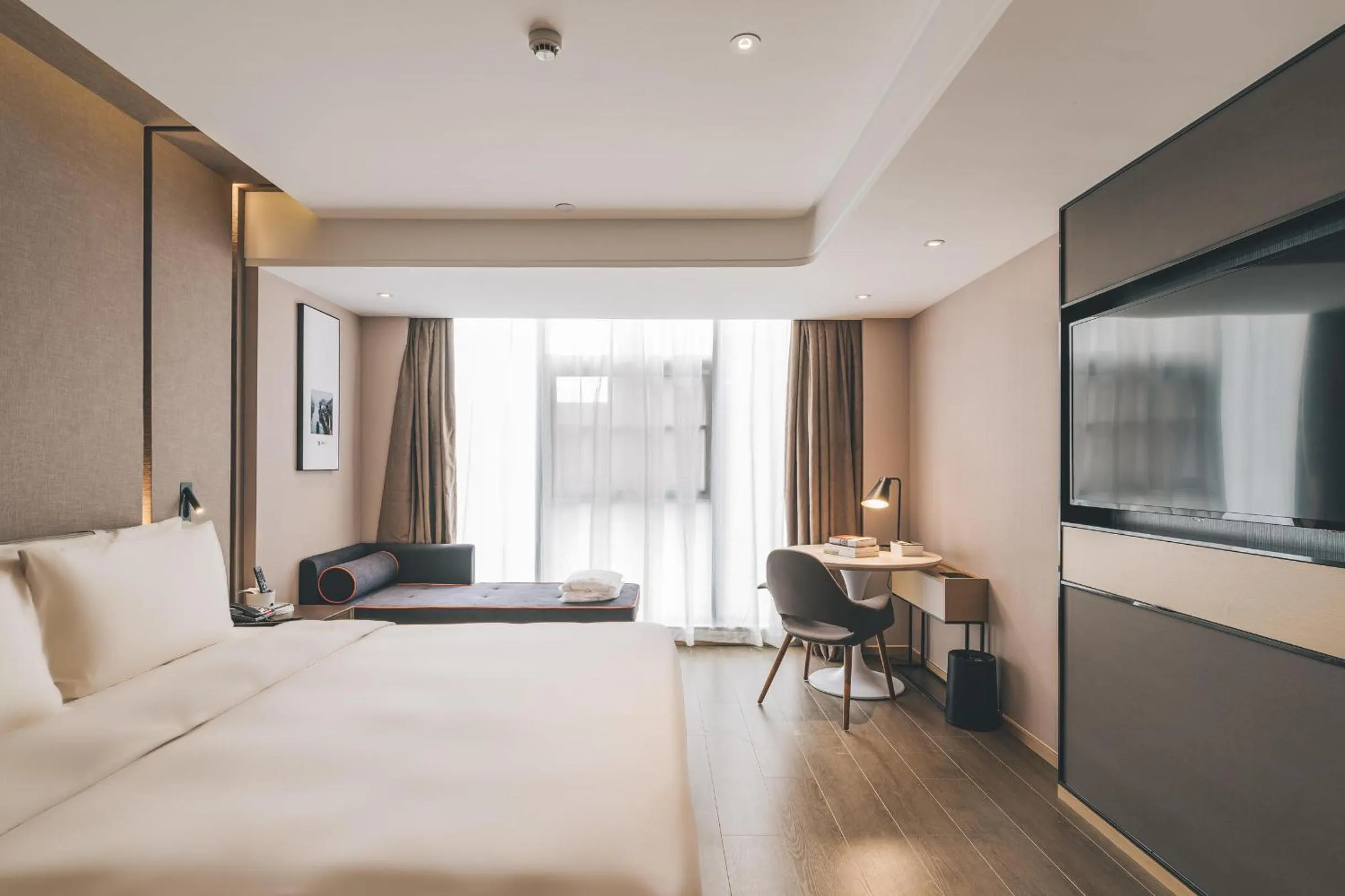 Bed in Atour Hotel Huzhou Dongwu