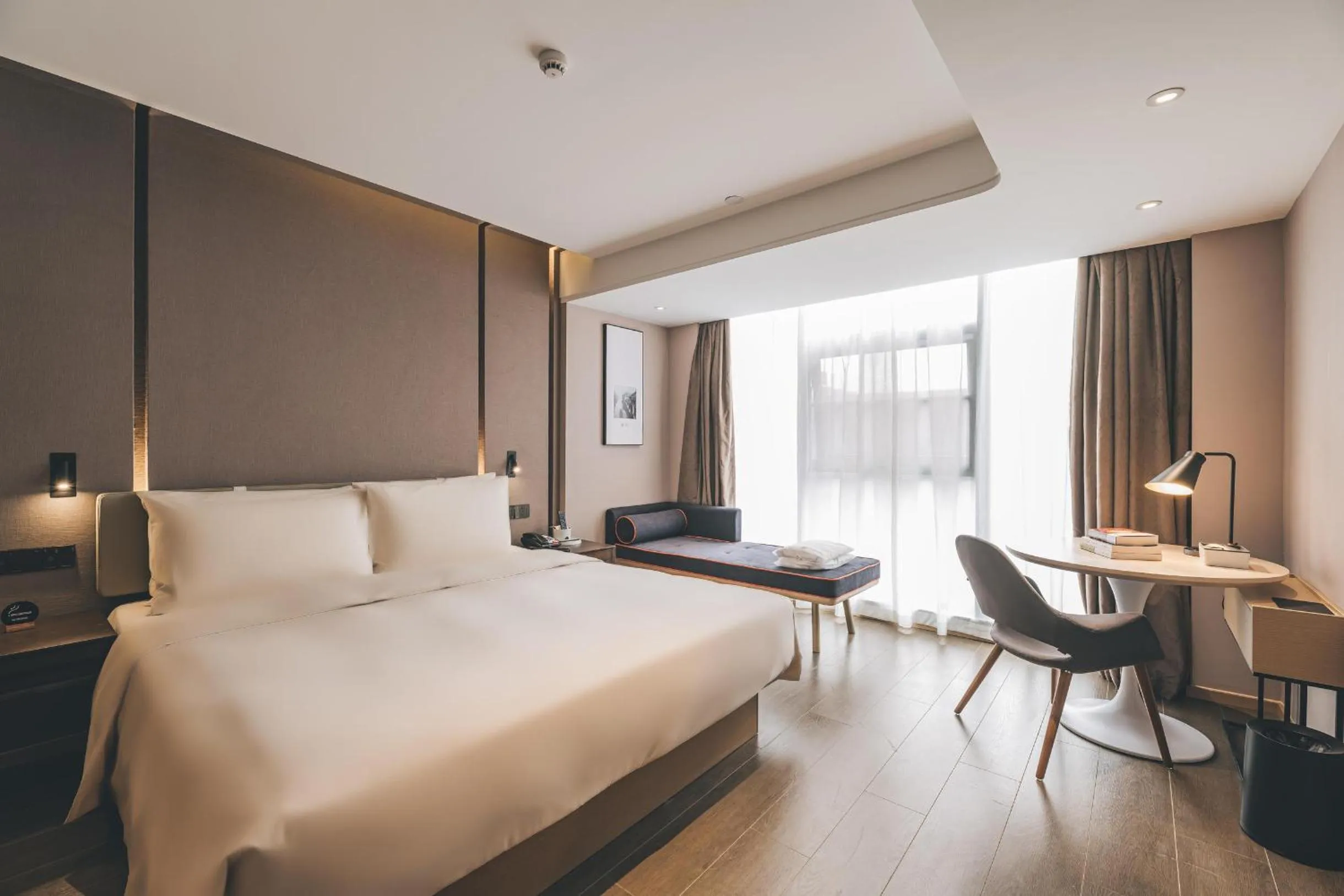 Bed in Atour Hotel Huzhou Dongwu