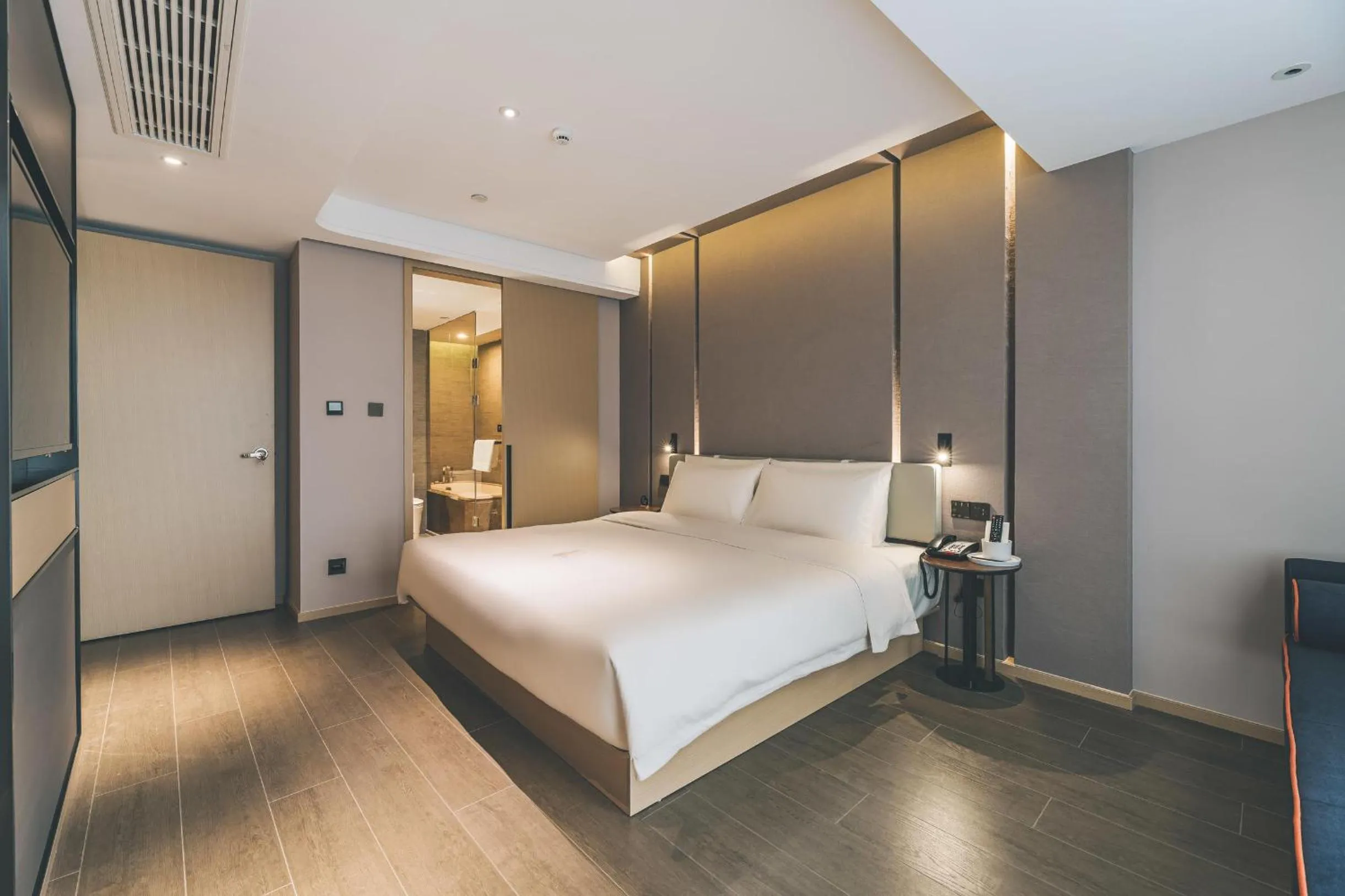 Bed in Atour Hotel Huzhou Dongwu