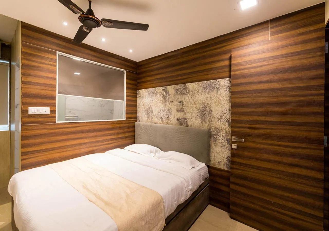 Photo of the whole room in Hotel New Sky Palace Residency- Near International Airport Andheri East