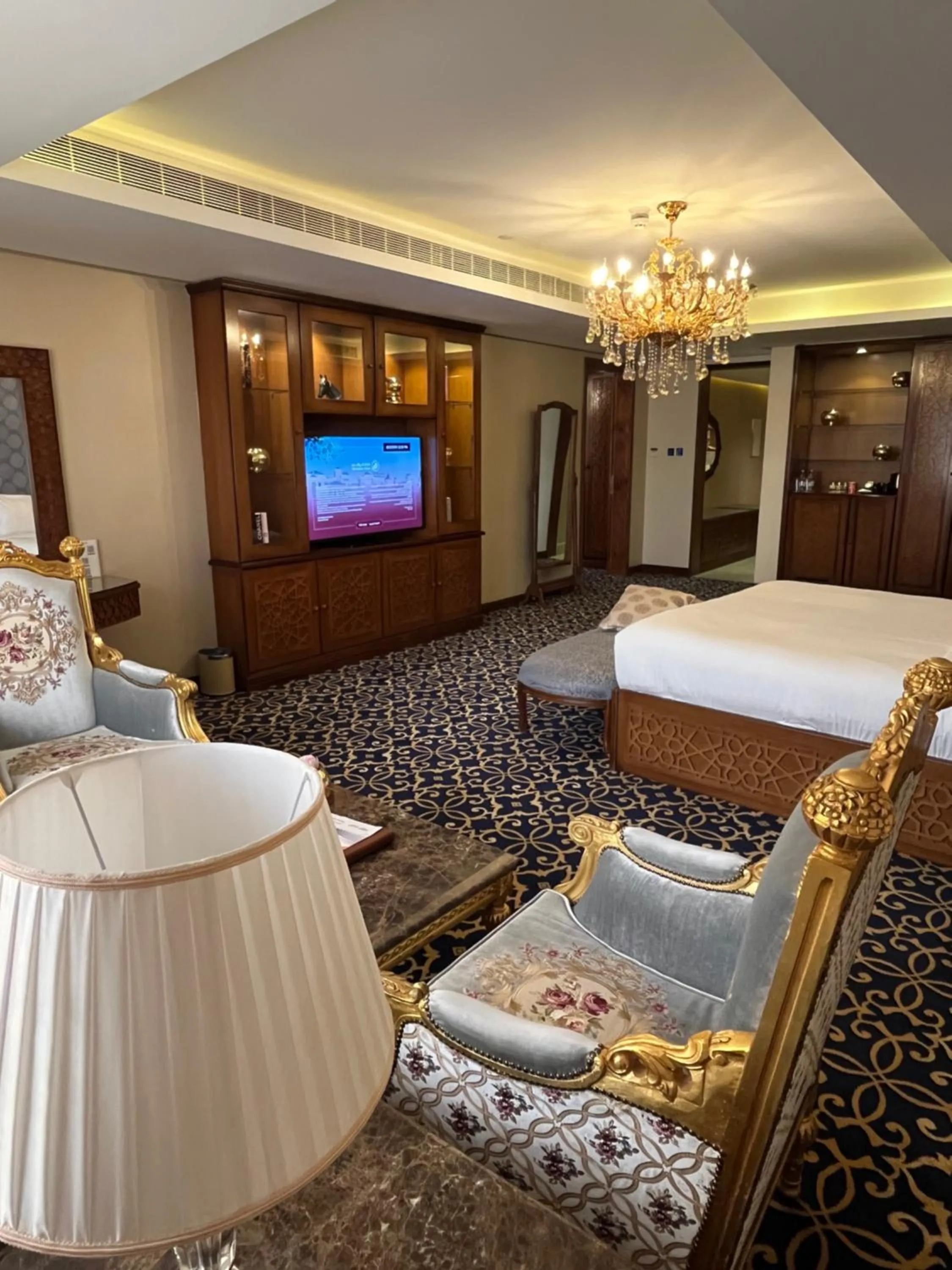 Communal lounge/ TV room, Bed in Al Rahden Hotel