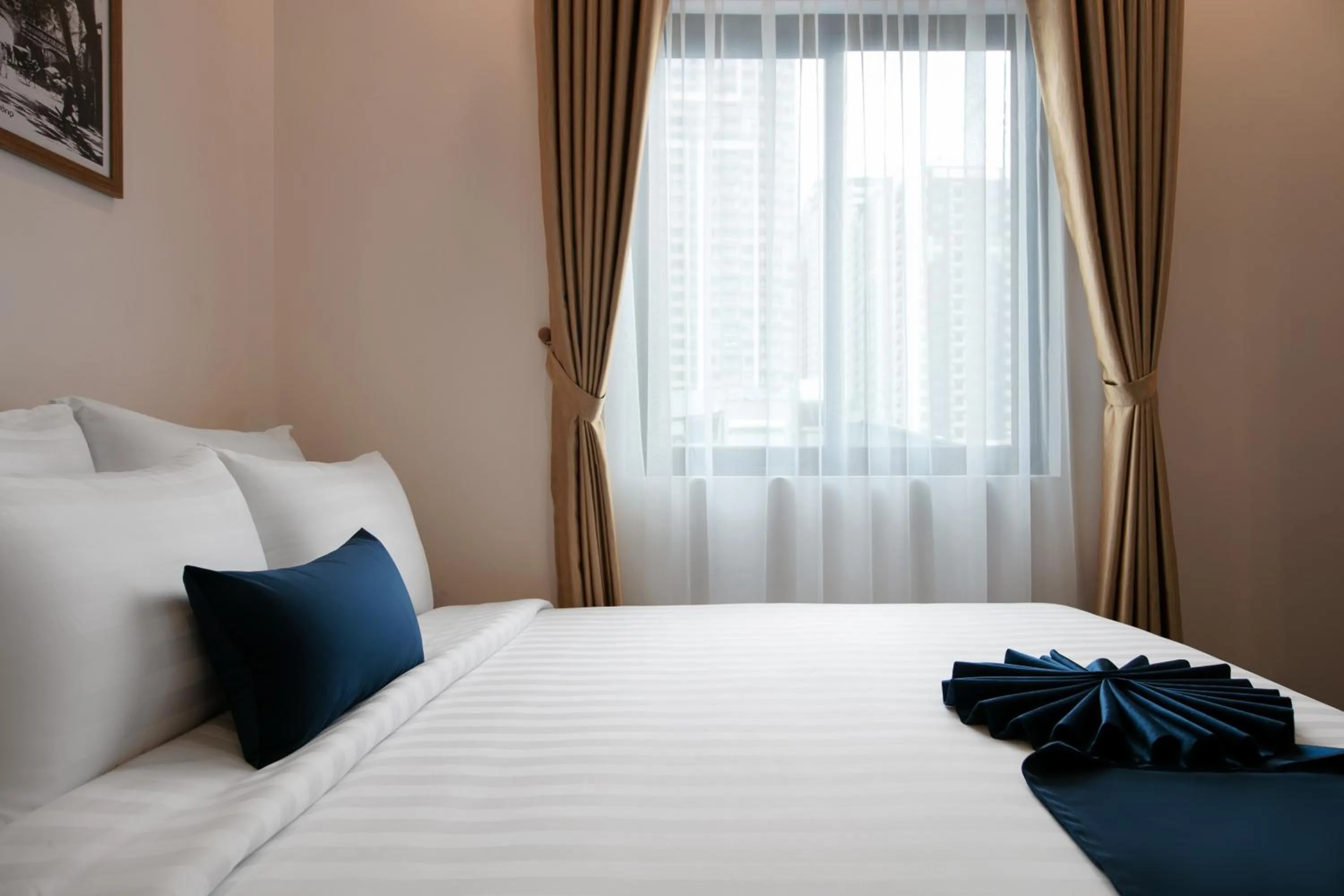 Bed in Patel Hotel Hanoi