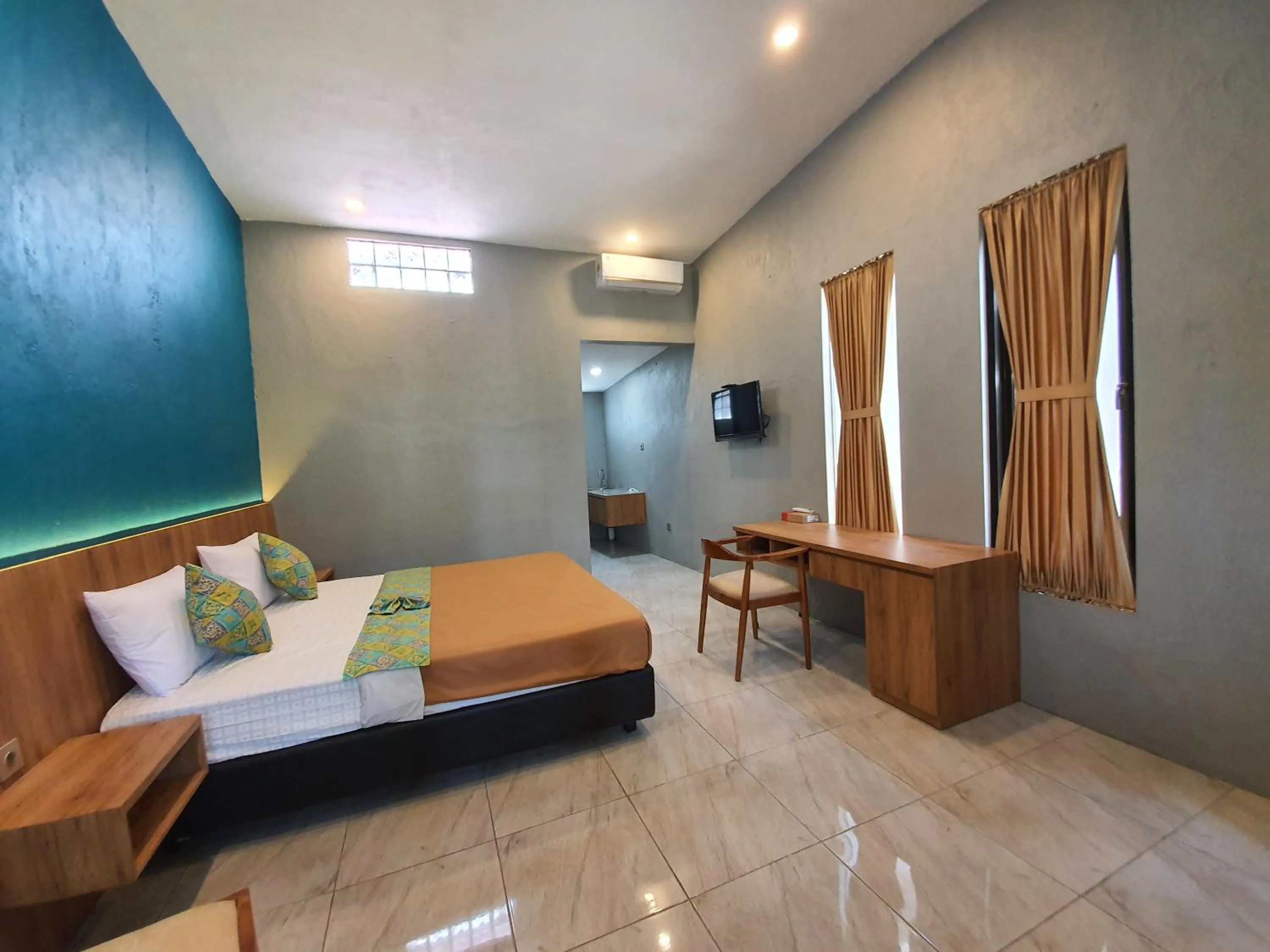 Photo of the whole room, Bed in Sanur Agung Suite