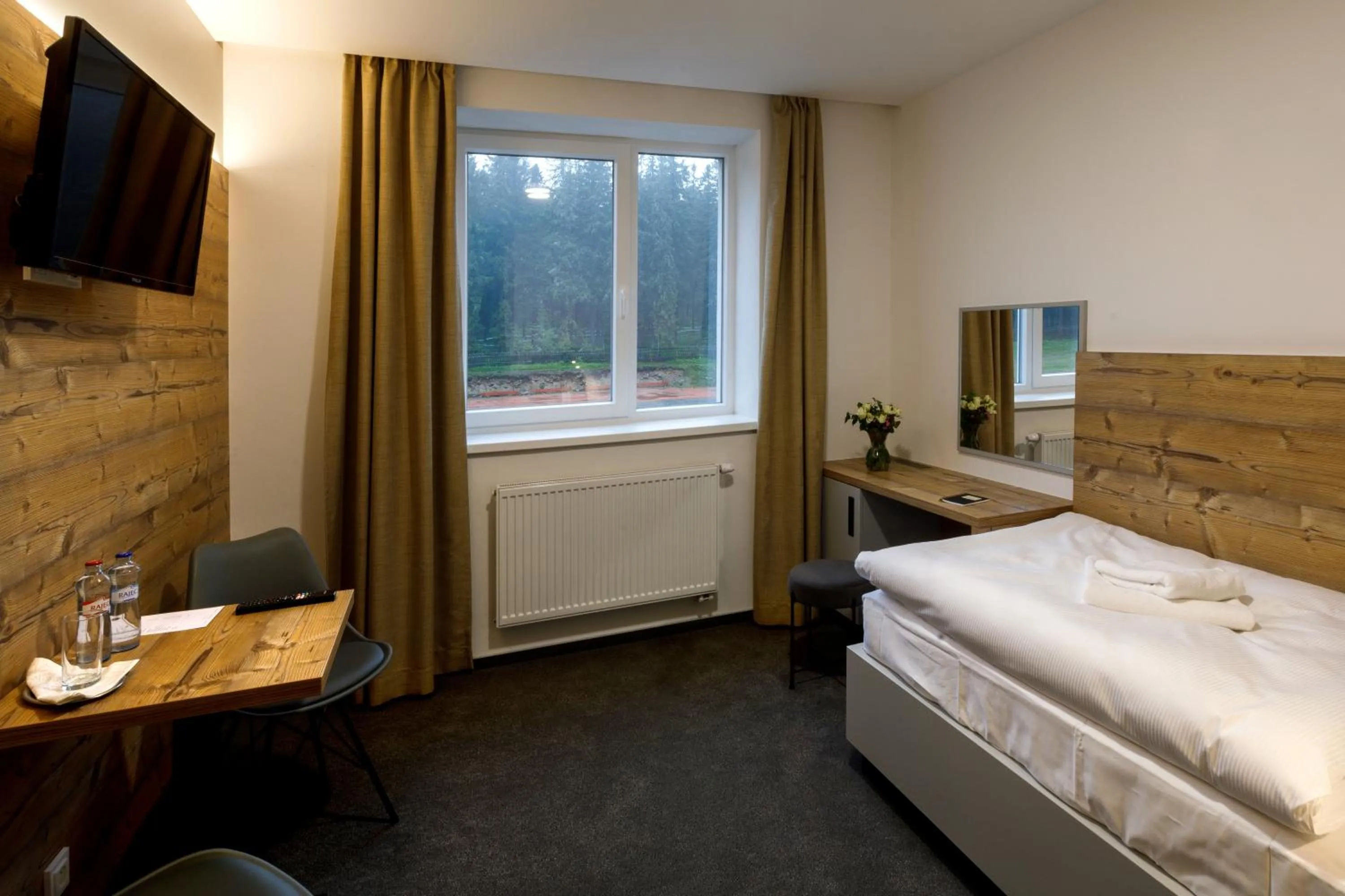 Photo of the whole room, Bed in Sporthotel Olympia