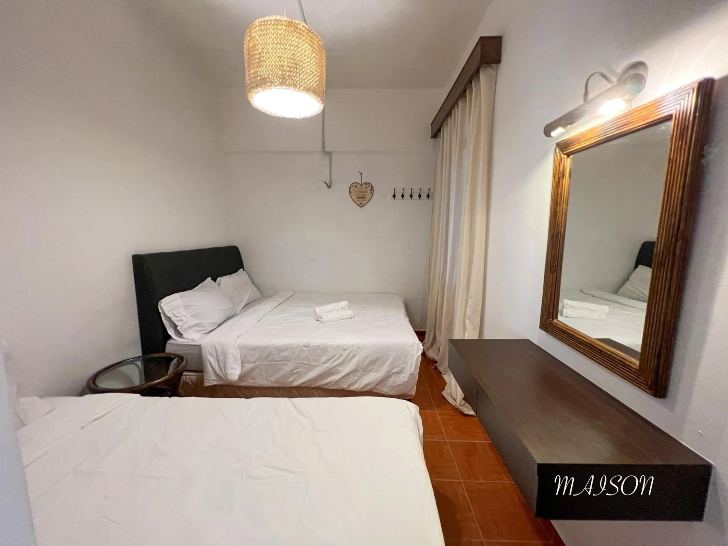 Bed in Maison Seaview Suites Port Dickson