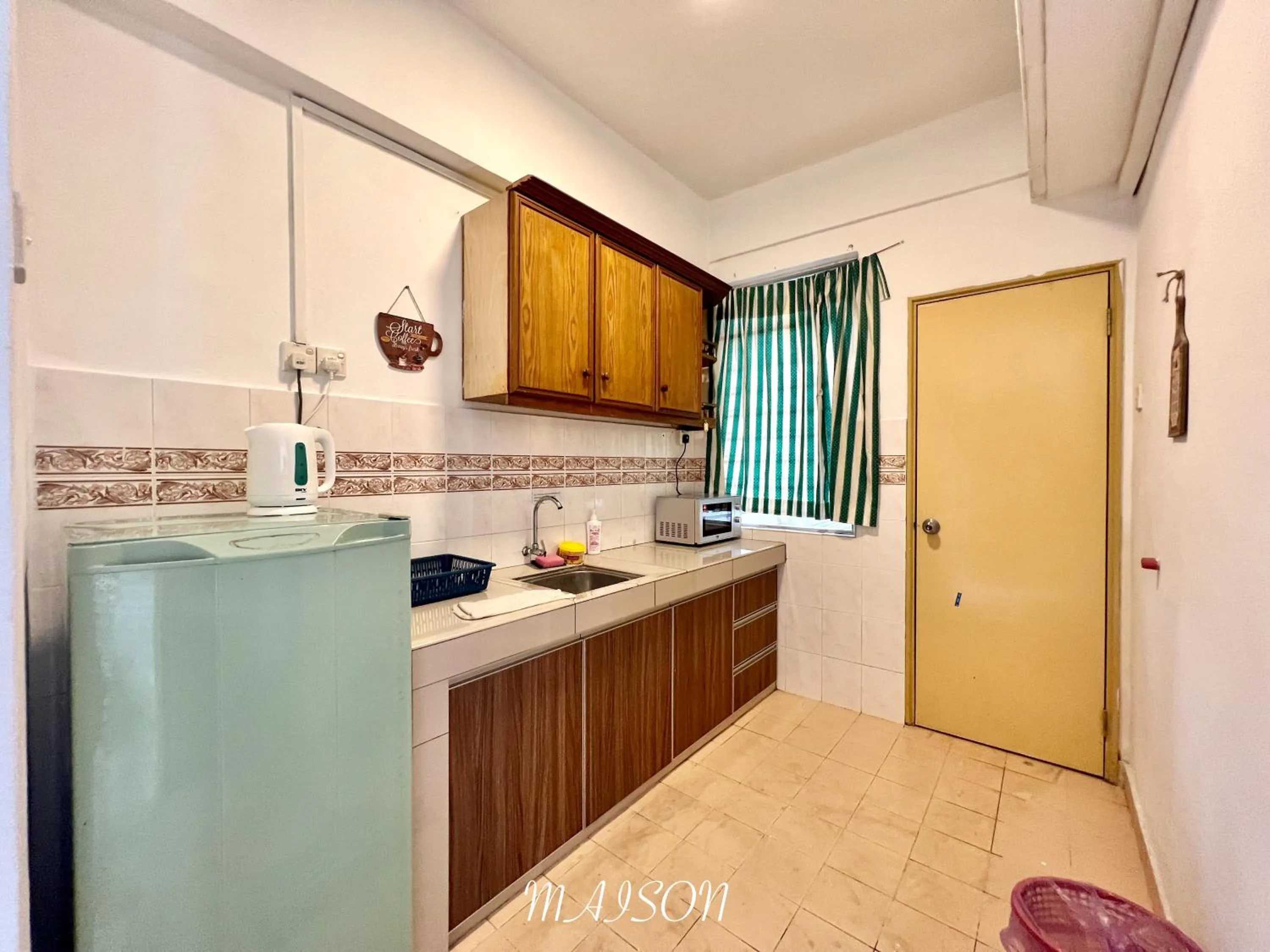 Kitchen or kitchenette in Maison Seaview Suites Port Dickson